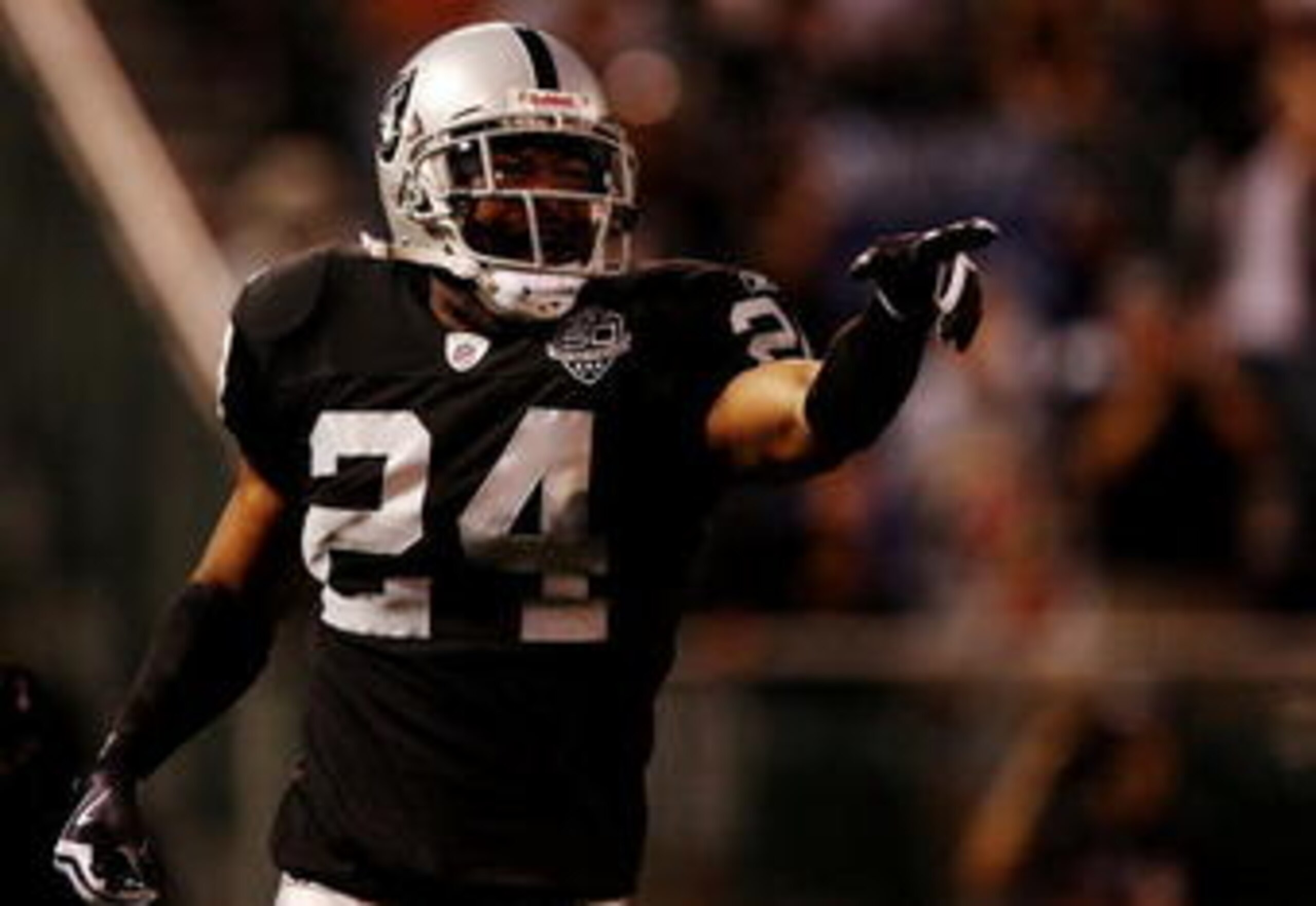 Michael Huff still has a problem tackling in the open field, but has greatly improved.