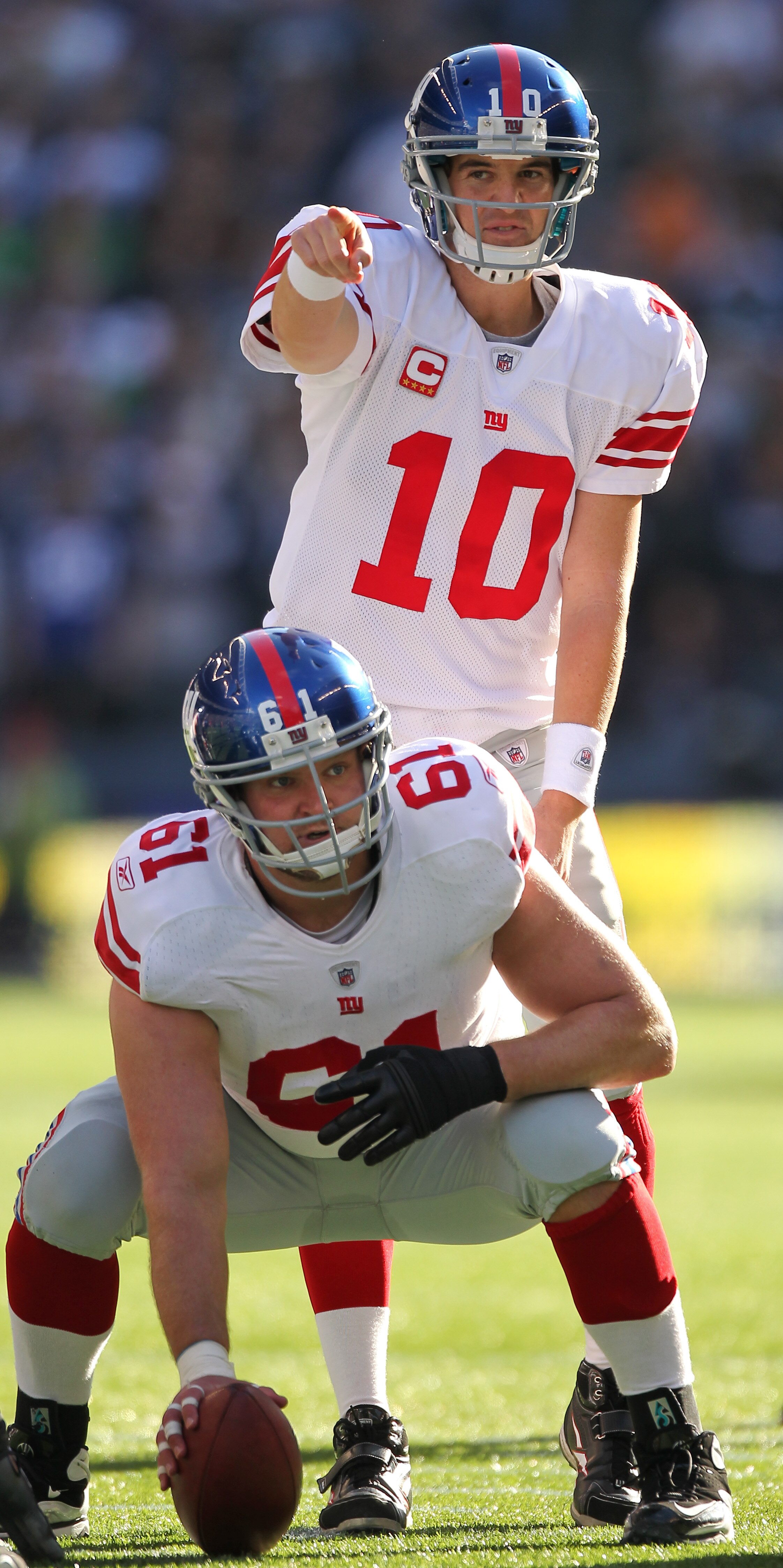 SEATTLE - NOVEMBER 07:  Quarterback Eli Manning #10 of the New York Giants points at the line of scrimmage against the Seattle Seahawks at Qwest Field on November 7, 2010 in Seattle, Washington. The Giants defeated the Seahawks 41-7. (Photo by Otto Greule