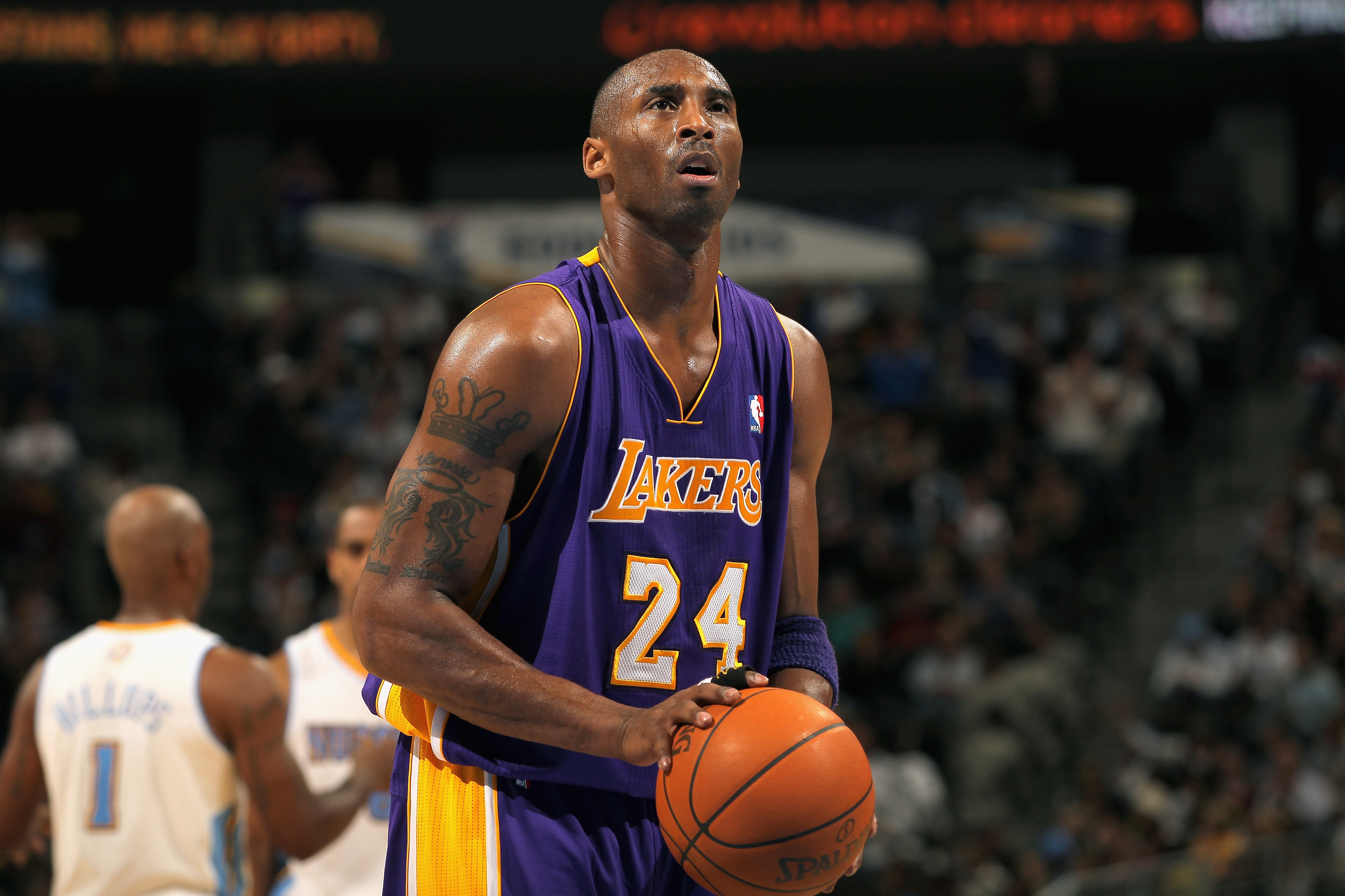 DENVER - NOVEMBER 11:  Kobe Bryant #24 of the Los Angeles Lakers takes a free throw against the Denver Nuggets at the Pepsi Center on November 11, 2010 in Denver, Colorado. The Nuggets defeated the Lakers 118-112.  NOTE TO USER: User expressly acknowledge