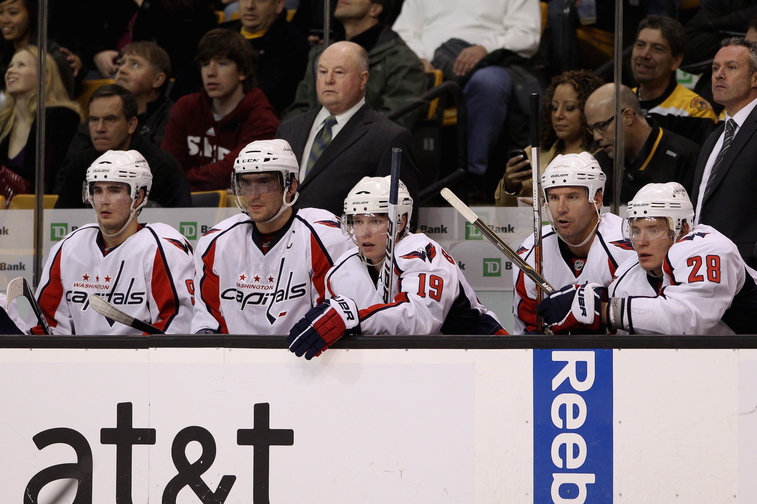 BOSTON - OCTOBER 21: Head coach Bruce Boudreau of the Washington Capitals and (l-r) Marcus Johansson #90, Alex Ovechkin #8, Nicklas Backstrom #19, Mike Knuble #22, Alexander Semin #28 and assistant coach Dean Evason look on from the bench against the Bos BOSTON - OCTOBER 21: Head coach Bruce Boudreau of the Washington Capitals and (l-r) Marcus Johansson #90, Alex Ovechkin #8, Nicklas Backstrom #19, Mike Knuble #22, Alexander Semin #28 and assistant coach Dean Evason look on from the bench against the Bos