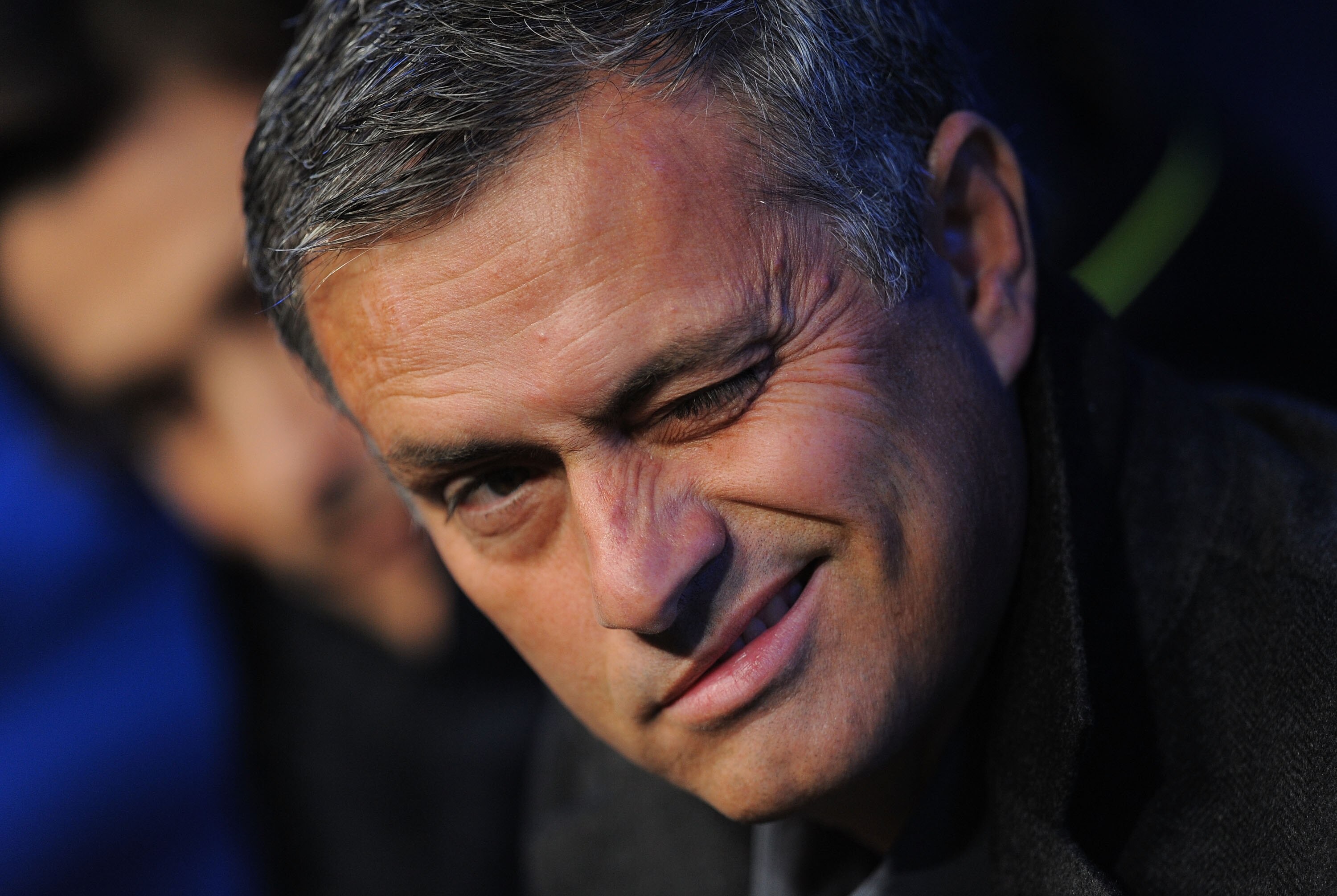 MADRID, SPAIN - NOVEMBER 07:  Real Madrid manager Jose Mourinho winks from the bench before the beginning of the La Liga match between Real Madrid and Atletico Madrid at Estadio Santiago Bernabeu on November 7, 2010 in Madrid, Spain.  (Photo by Denis Doyl