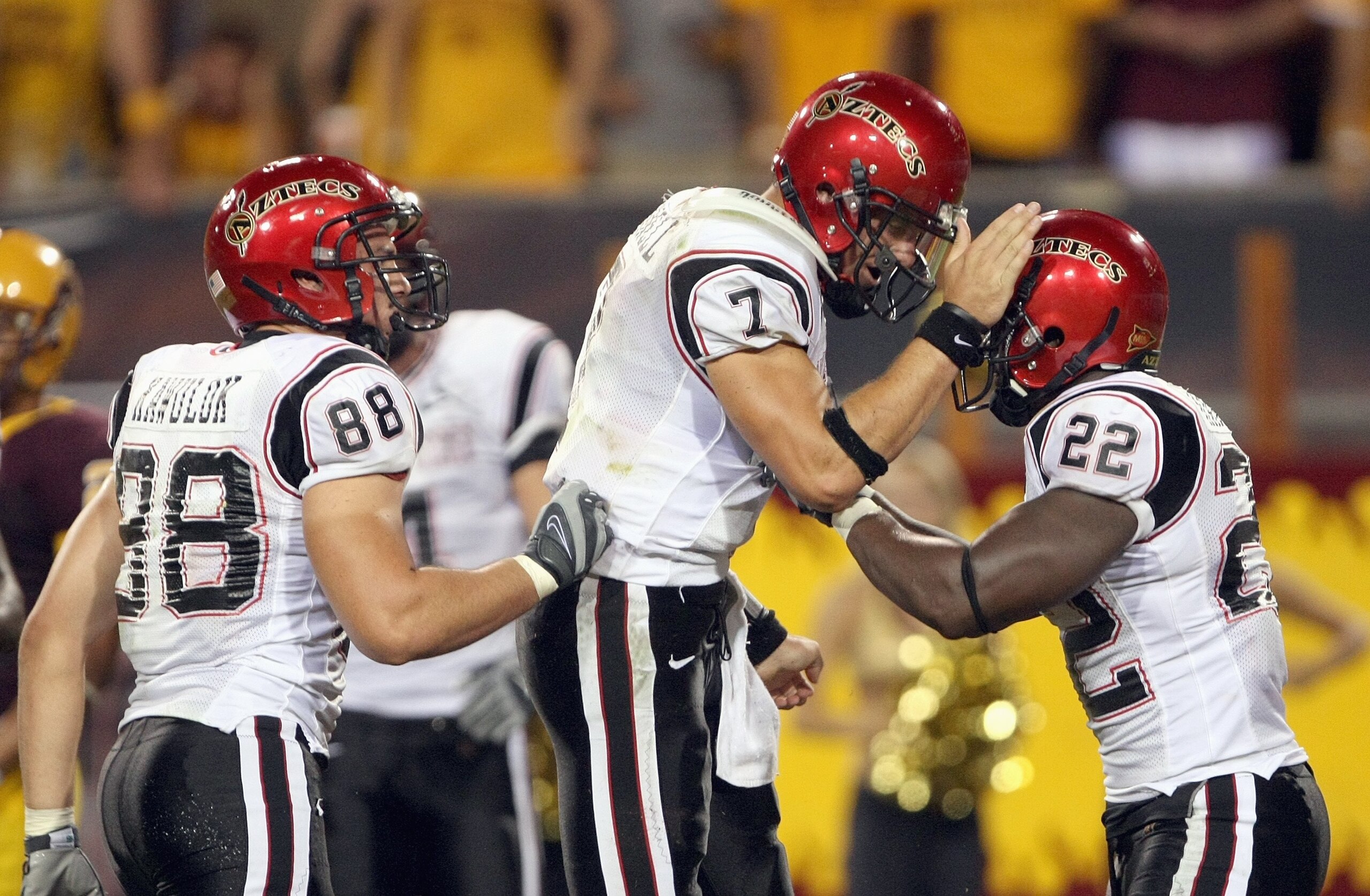 TEMPE, AZ - SEPTEMBER 15: Quarterback Kevin O'Connell #7 of the San Diego State Aztecs celebrates with  Lynell Hamilton#22 during the game against the Arizona State Sun Devils on September 15, 2007 at Sun Devil Stadium in Tempe, Arizona.  (Photo by Stephe