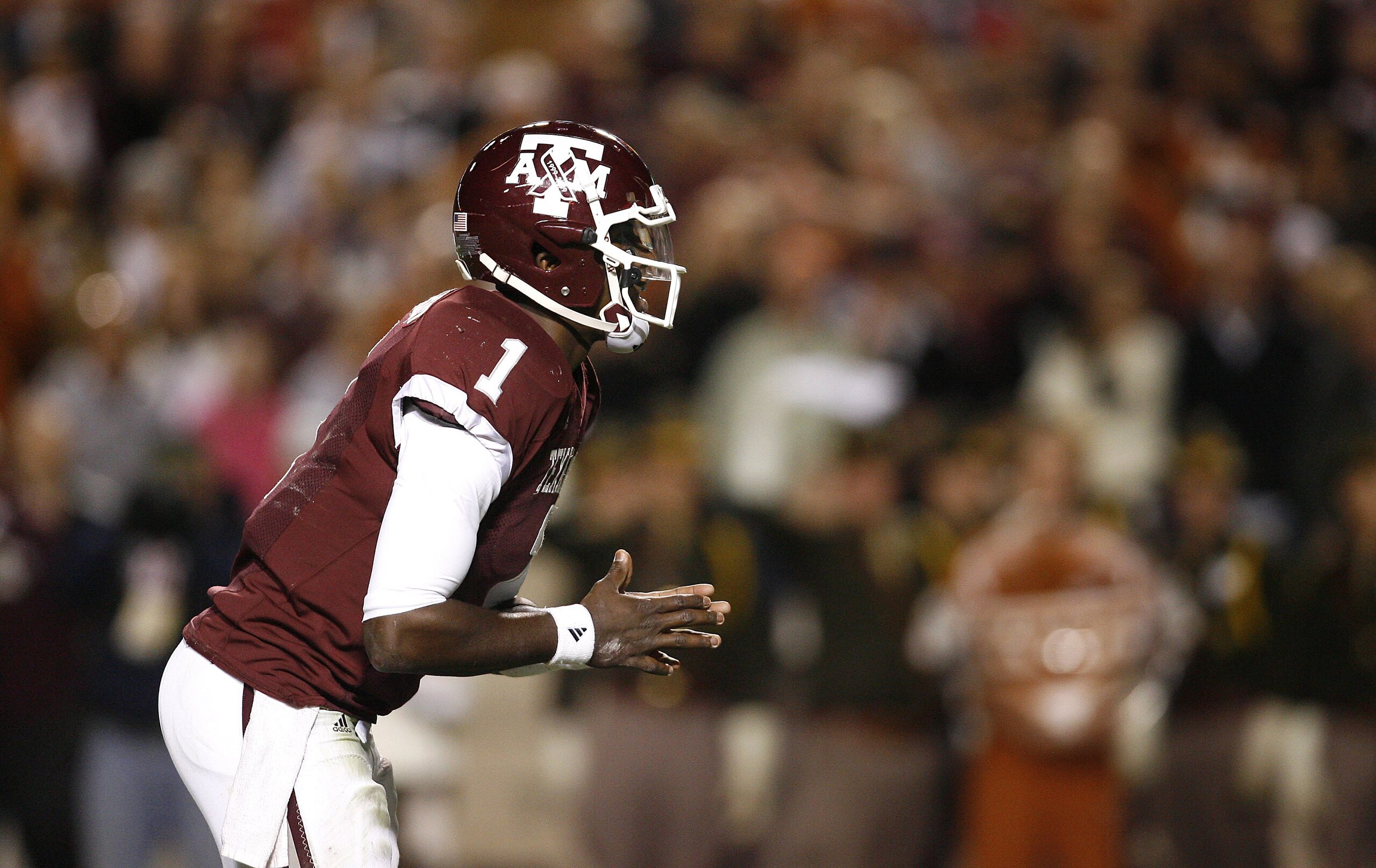 COLLEGE STATION, TX - NOVEMBER 26: Quarterback Jerrod Johnson #1 of the Texas A&M Aggies against the Texas Longhorns in the second half at Kyle Field on November 26, 2009 in College Station, Texas. The Longhorns defeated the Aggies 49-39 (Photo by Aaron M COLLEGE STATION, TX - NOVEMBER 26: Quarterback Jerrod Johnson #1 of the Texas A&M Aggies against the Texas Longhorns in the second half at Kyle Field on November 26, 2009 in College Station, Texas. The Longhorns defeated the Aggies 49-39 (Photo by Aaron M
