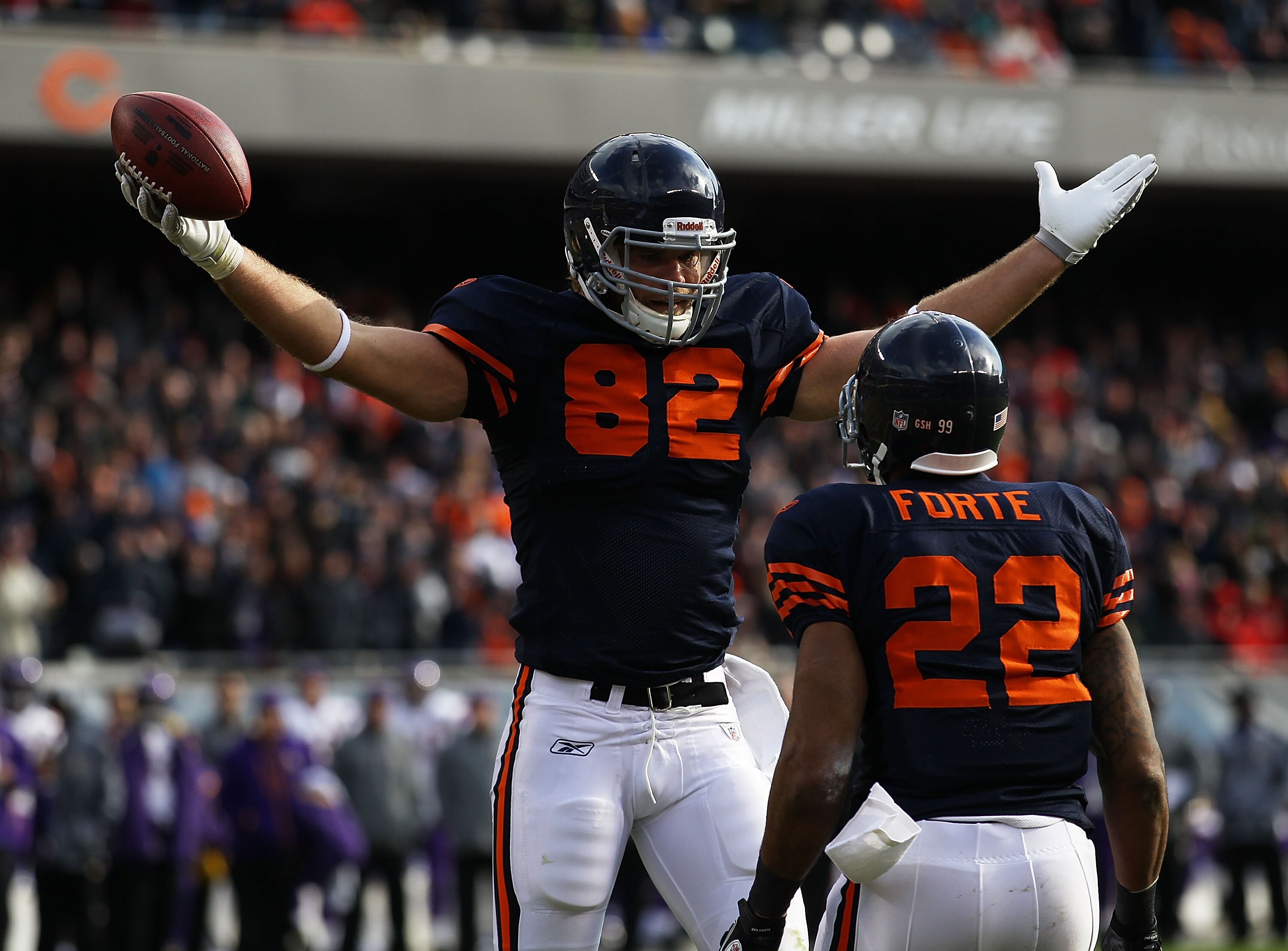 CHICAGO - NOVEMBER 14: Greg Olsen #82 of the Chicago Bears celebrates a touchdown catch with teammate Matt Forte #22 against the Minnesota Vikings at Soldier Field on November 14, 2010 in Chicago, Illinois. (Photo by Jonathan Daniel/Getty Images)