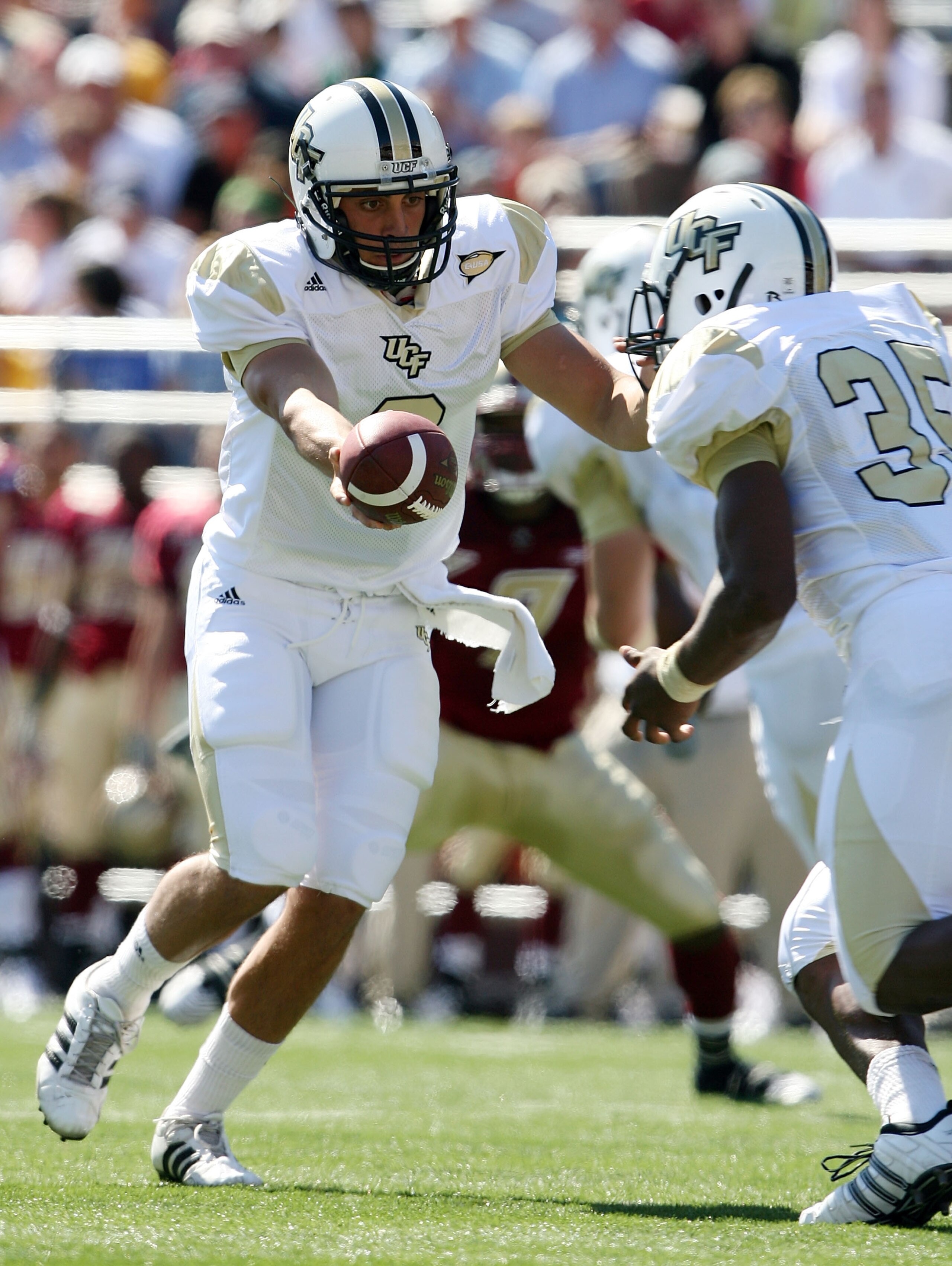CHESTNUT HILL, MA - SEPTEMBER 20: Michael Greco #2 of the Central Florida Knights hands the ball off to Ronnie Weaver #35 in the first half against the Boston College Eagles on September 20, 2008 at Alumni Stadium in Chestnut Hill, Massachusetts. (Photo CHESTNUT HILL, MA - SEPTEMBER 20: Michael Greco #2 of the Central Florida Knights hands the ball off to Ronnie Weaver #35 in the first half against the Boston College Eagles on September 20, 2008 at Alumni Stadium in Chestnut Hill, Massachusetts. (Photo