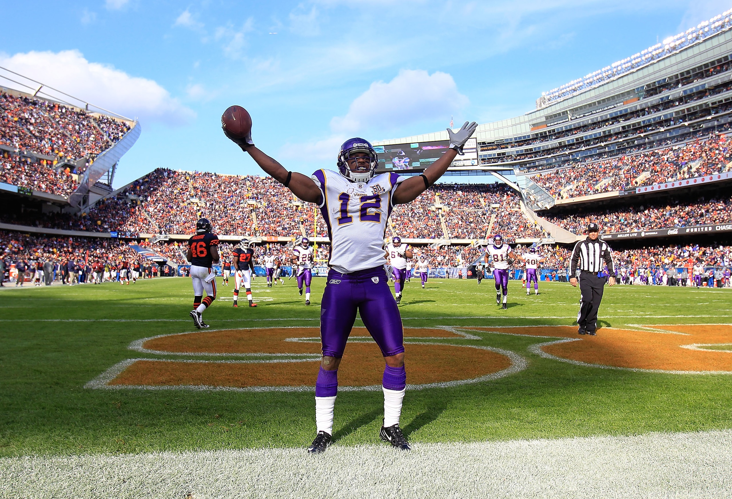 CHICAGO - NOVEMBER 14: Percey Harvin #12 of the Minnesota Vikings celebrates a touchdown catch against the Chicago Bears at Soldier Field on November 14, 2010 in Chicago, Illinois. (Photo by Jonathan Daniel/Getty Images)