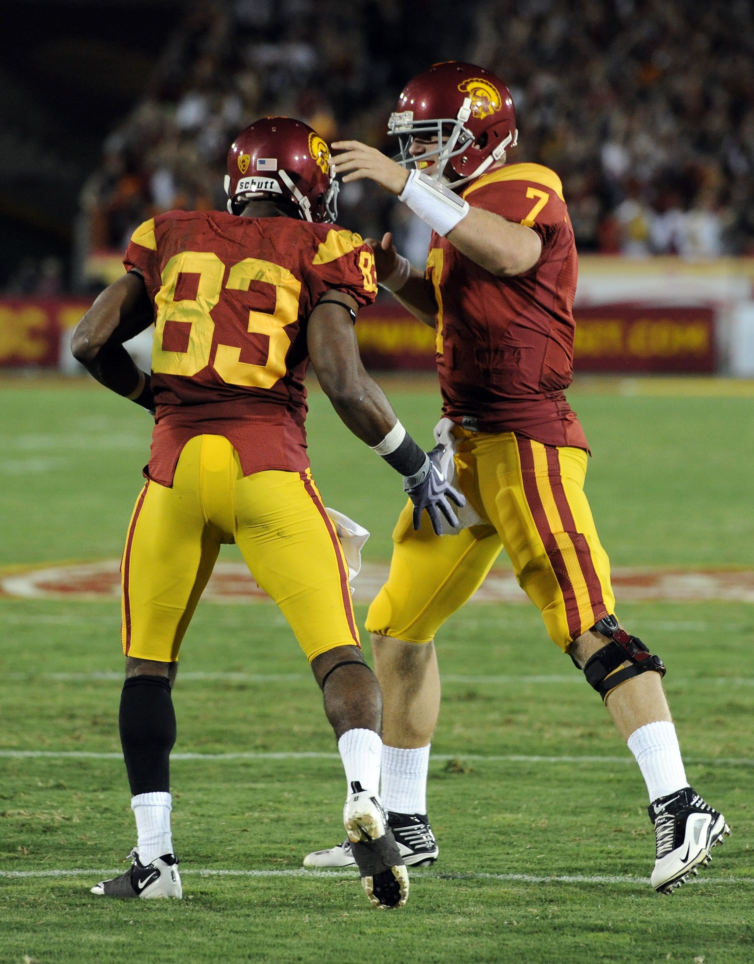 LOS ANGELES, CA - OCTOBER 30: Matt Barkley #7 and Ronald Johnson #83 of USC Trojans celebrate a touchdown to trail 24-29 against the Oregon Ducks during the third quarter at Los Angeles Memorial Coliseum on October 30, 2010 in Los Angeles, California. ( LOS ANGELES, CA - OCTOBER 30: Matt Barkley #7 and Ronald Johnson #83 of USC Trojans celebrate a touchdown to trail 24-29 against the Oregon Ducks during the third quarter at Los Angeles Memorial Coliseum on October 30, 2010 in Los Angeles, California. (