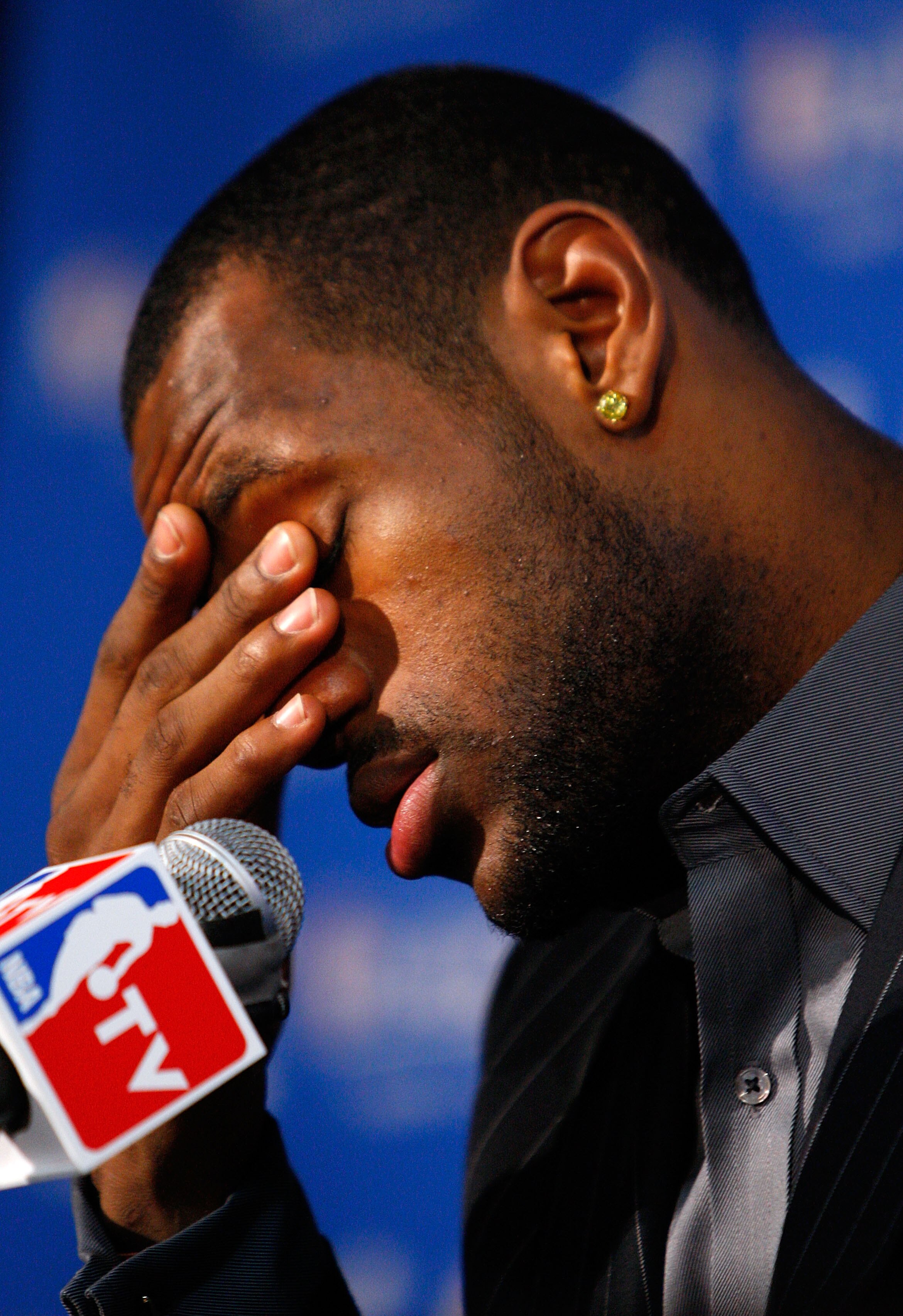 BOSTON - MAY 18:  LeBron James #23 of the Cleveland Cavaliers wipes his face during his post game press conference after the Cavaliers lost 97-92 against the Boston Celtics in Game Seven of the Eastern Conference Semifinals during the 2008 NBA Playoffs at
