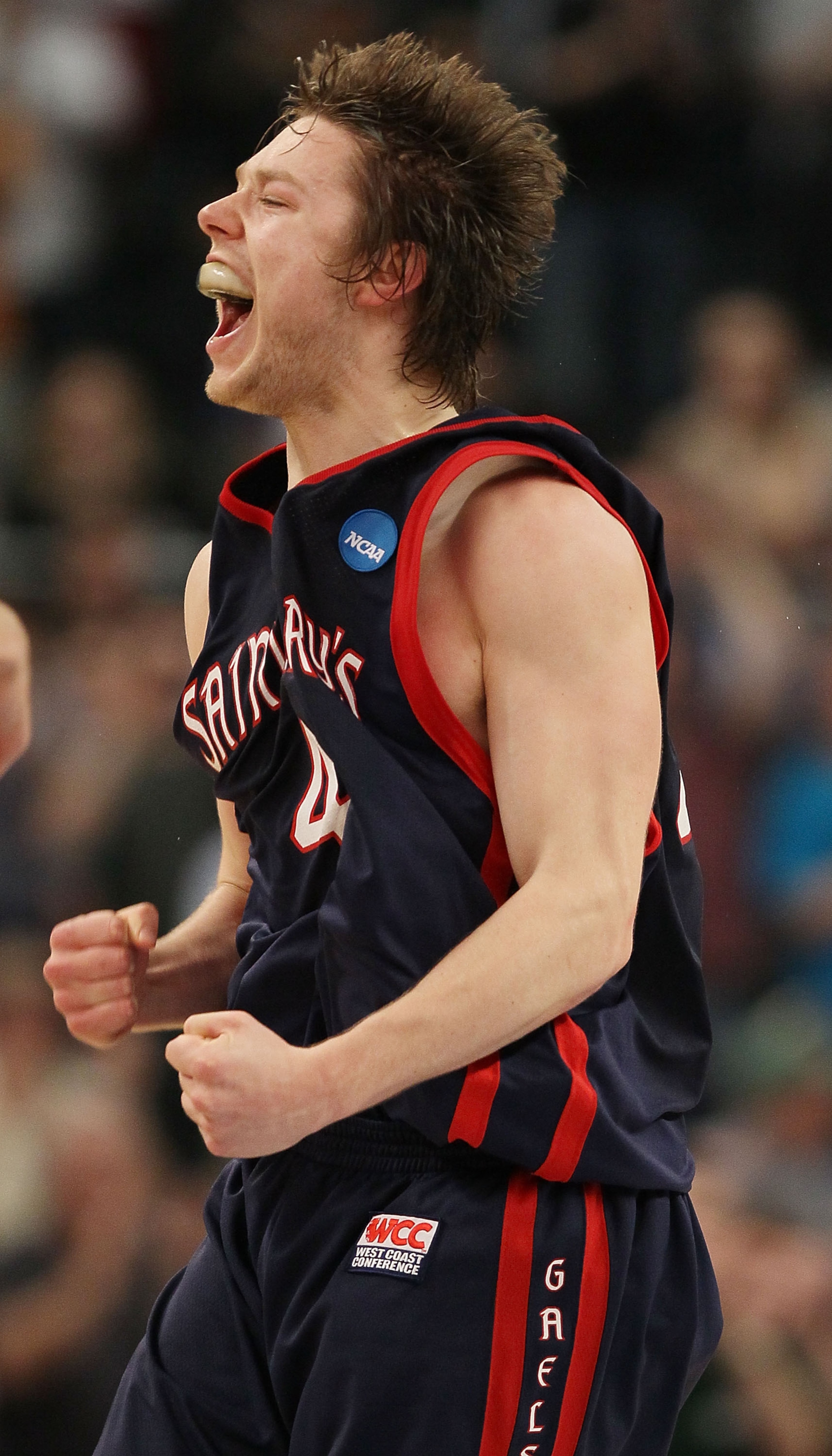 PROVIDENCE, RI - MARCH 20:  Matthew Dellavedova #4 of the Saint Mary's Gaels celebrates the win over the Villanova Wildcats during the second round of the 2010 NCAA men's basketball tournament on March 20, 2010 at the Dunkin Donuts Center in Providence, R