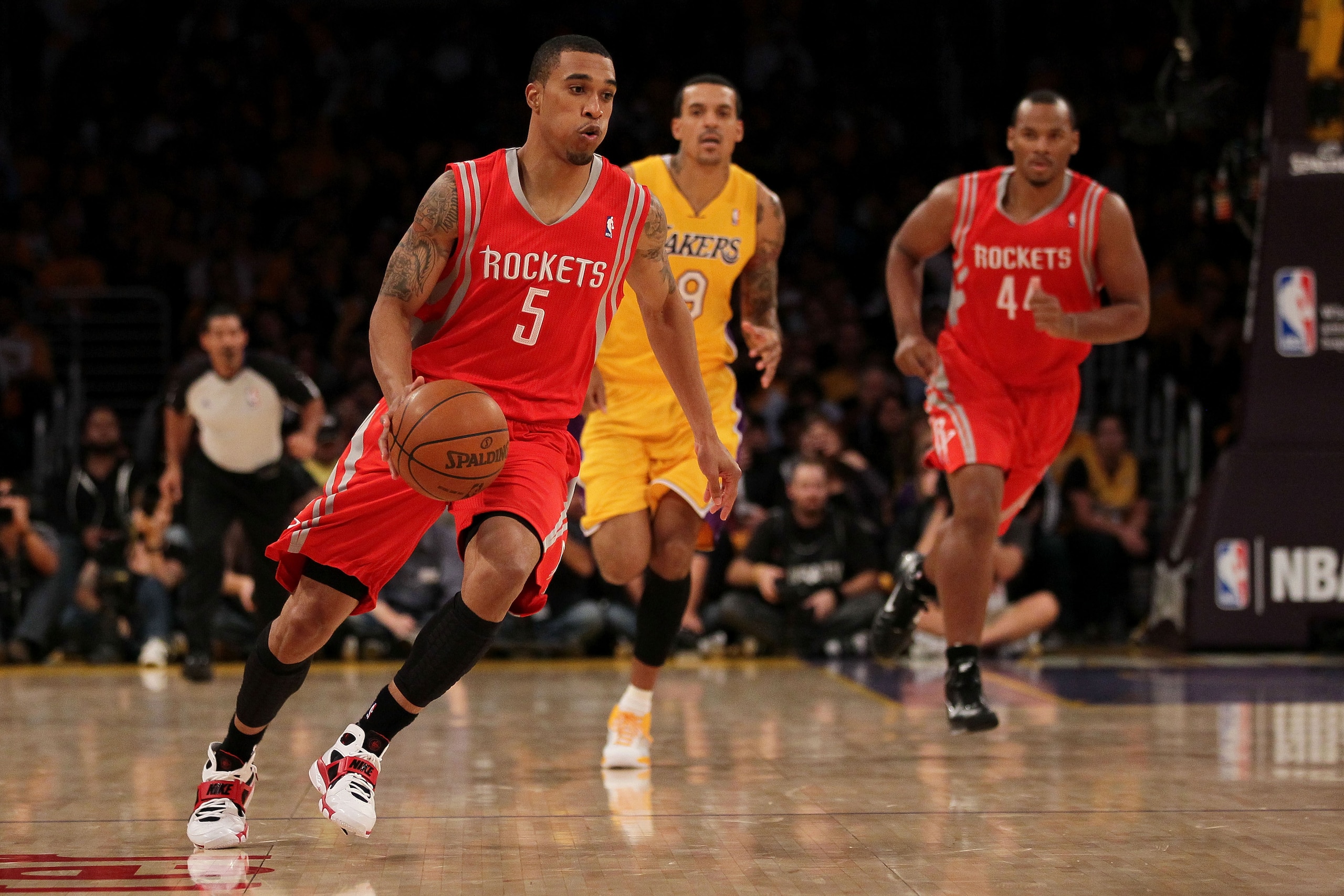 LOS ANGELES, CA - OCTOBER 26:  Courtney Lee #5 of the Houston Rockets drives with the ball against the Los Angeles Lakers during their opening night game at Staples Center on October 26, 2010 in Los Angeles, California. NOTE TO USER: User expressly acknow