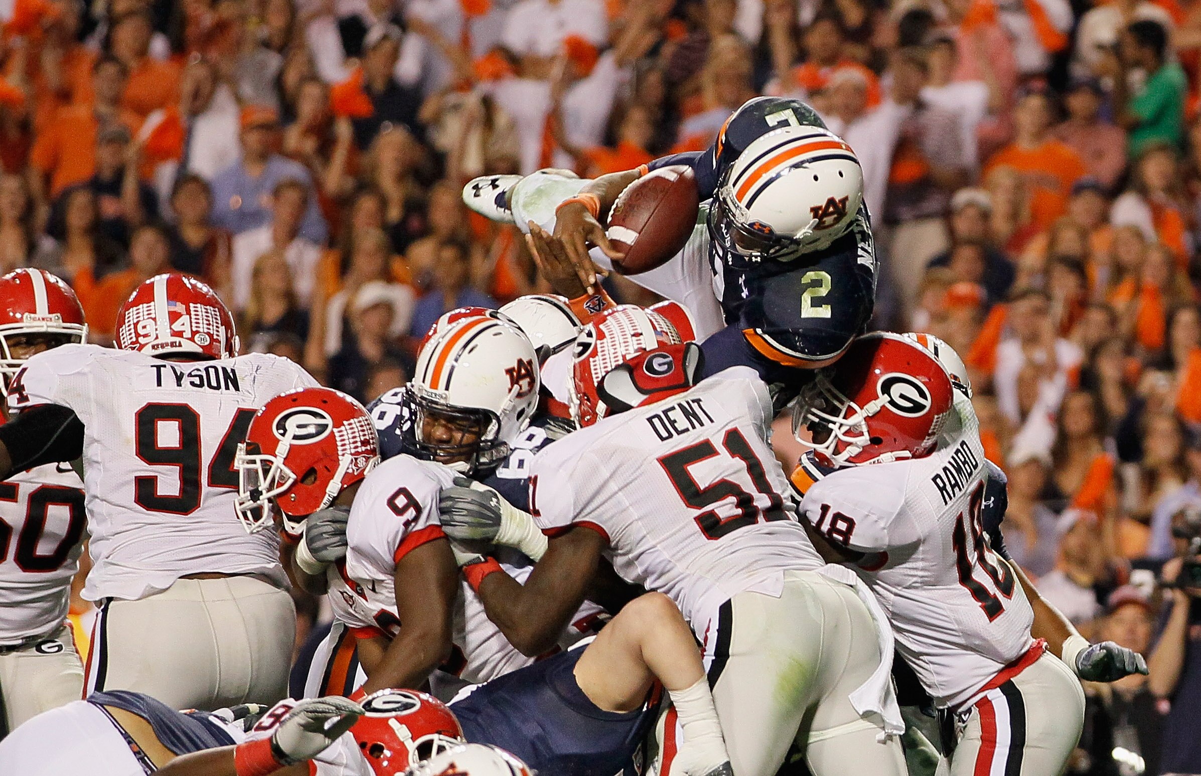 AUBURN, AL - NOVEMBER 13:  Quarterback Cameron Newton #2 of the Auburn Tigers dives across the defense for a touchdown against the Georgia Bulldogs at Jordan-Hare Stadium on November 13, 2010 in Auburn, Alabama.  (Photo by Kevin C. Cox/Getty Images)