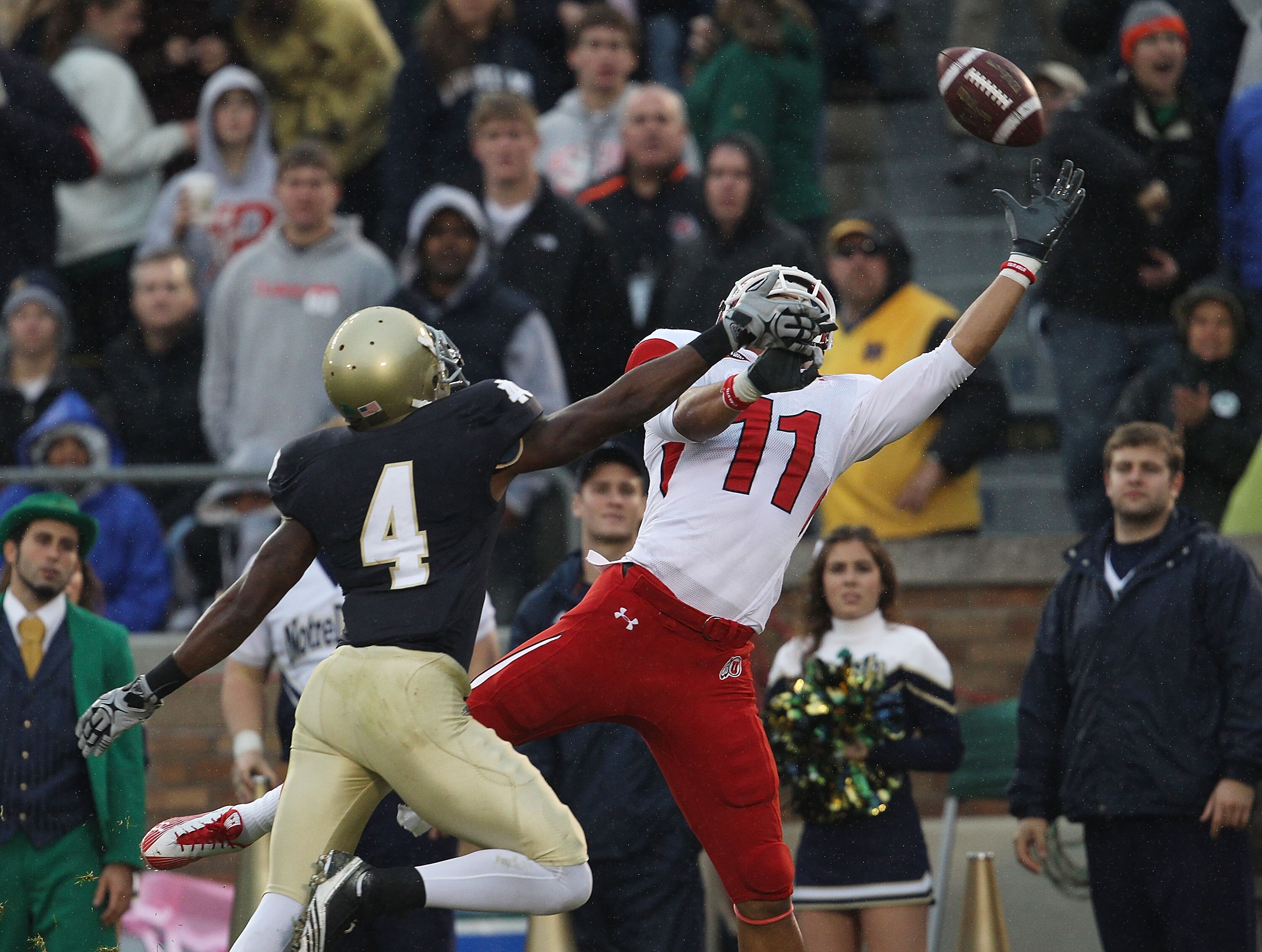 SOUTH BEND, IN - NOVEMBER 13: Gary Gray #4 of the Notre Dame Fighting Irish gets his hand in the face of Luke Matthews #11 of the Utah Utes at Notre Dame Stadium forcing an incomplete pass on November 13, 2010 in South Bend, Indiana. (Photo by Jonathan Da