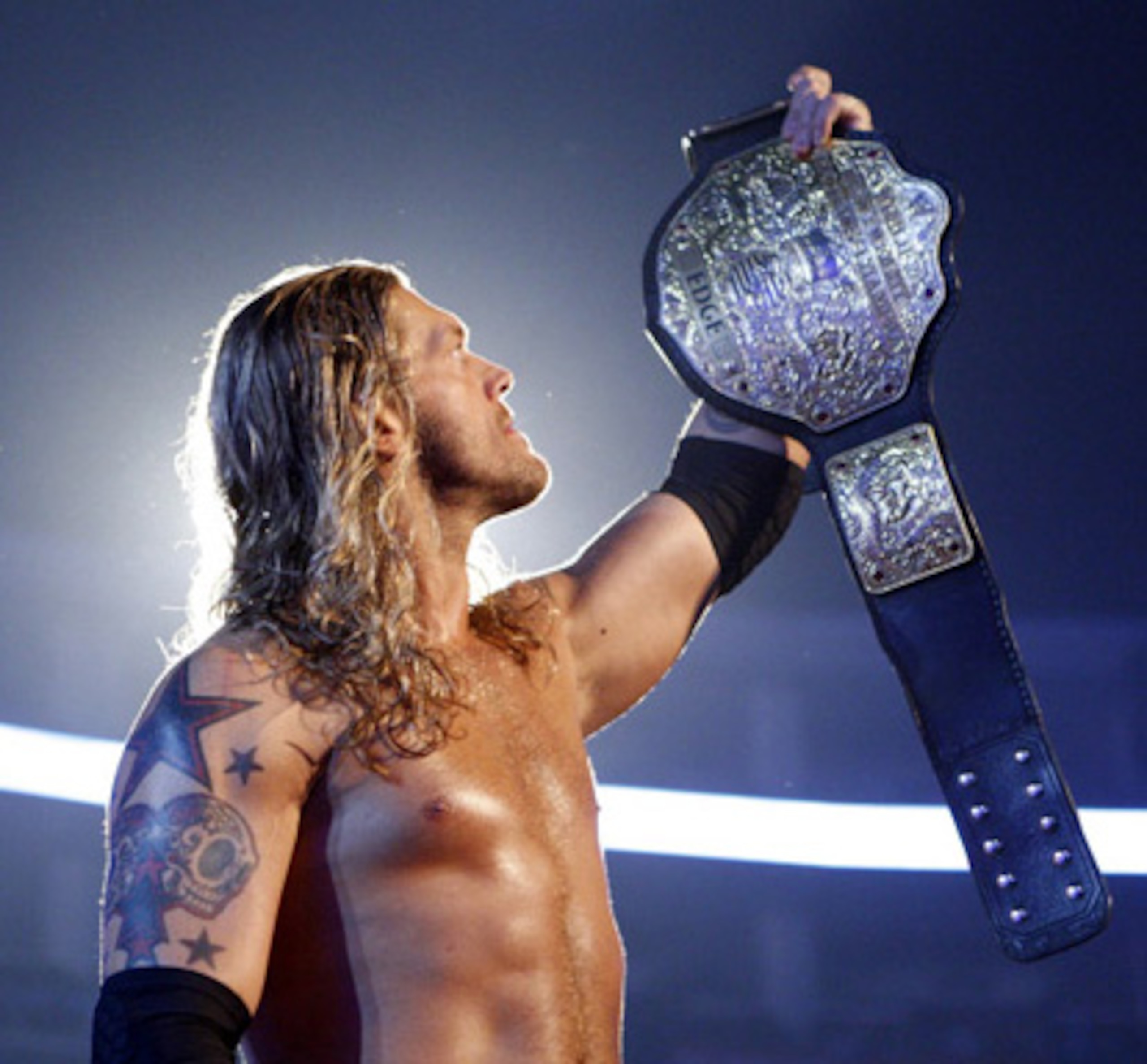 Edge with the World Heavyweight Championship, photo copyright to WWE.com