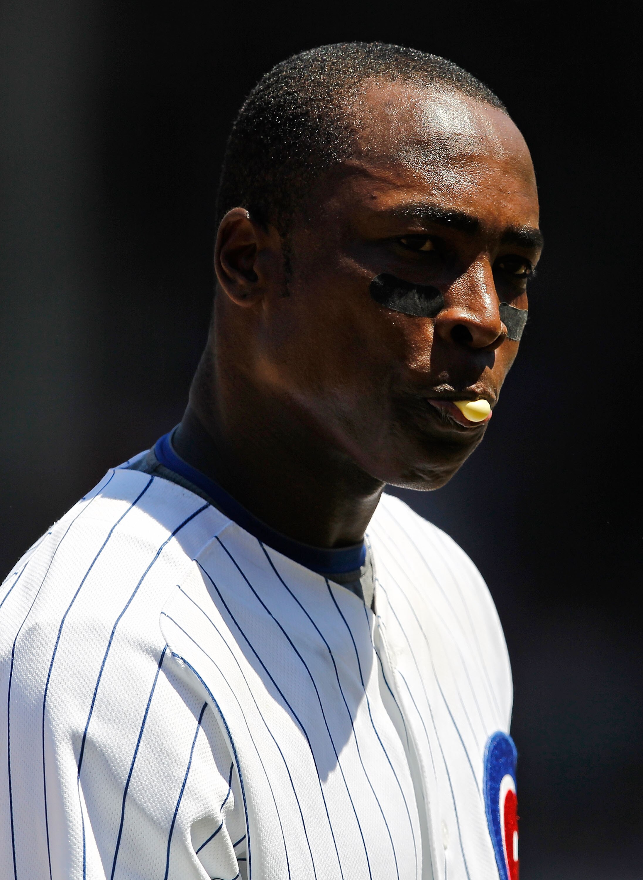 CHICAGO - JULY 03: Alfonso Soriano #12 of the Chicago Cubs waits on 3rd base as the Cincinnati Reds change pitchers at Wrigley Field on July 3, 2010 in Chicago, Illinois. The Cubs defeated the Reds 3-1.  (Photo by Jonathan Daniel/Getty Images)