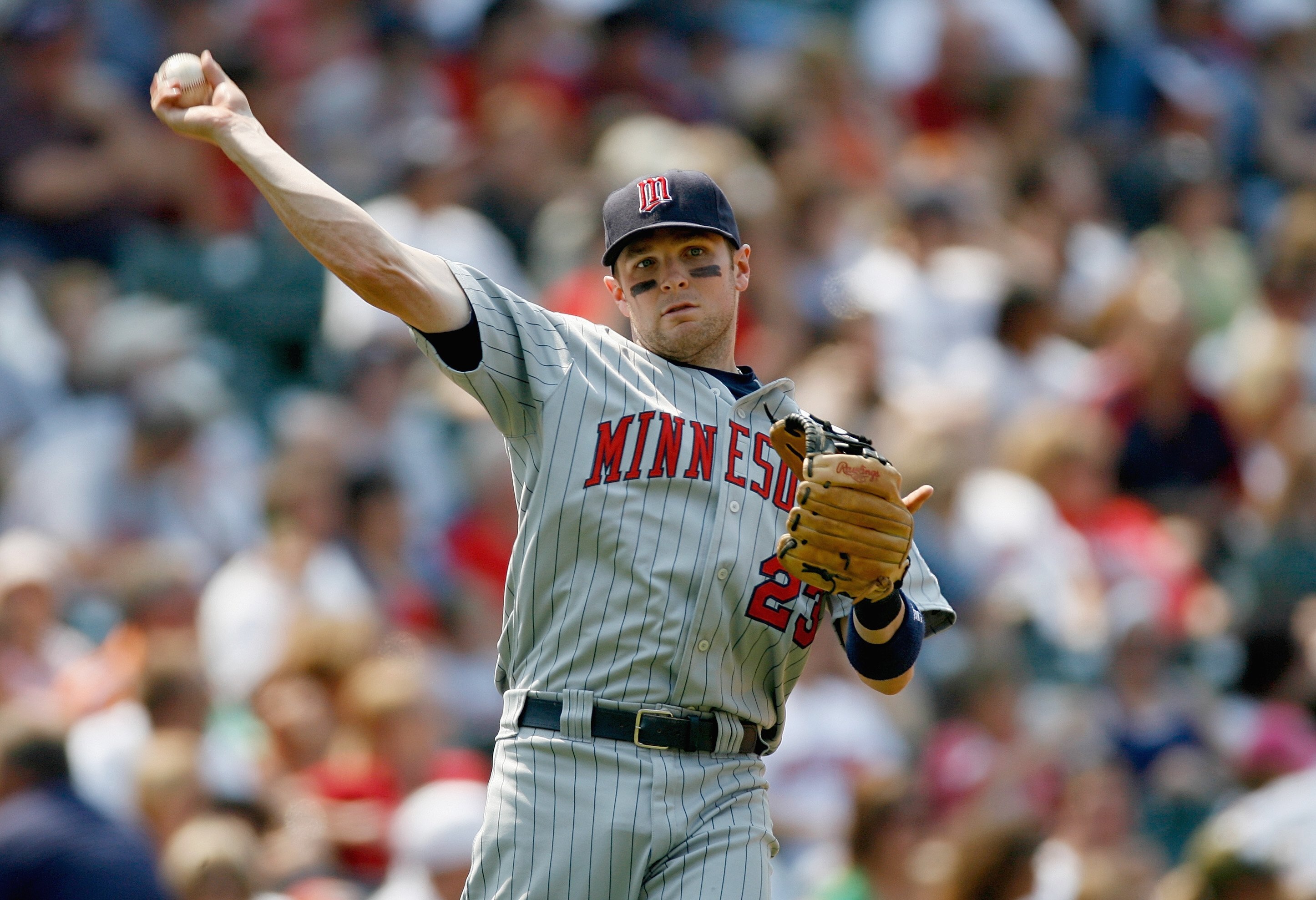 CLEVELAND - JULY 27:  Brendan Harris #23 of the Minnesota Twins fields during the game against the Cleveland Indians at Progressive Field on July 27, 2008 in Cleveland, Ohio.  (Photo by:  Gregory Shamus/Getty Images)