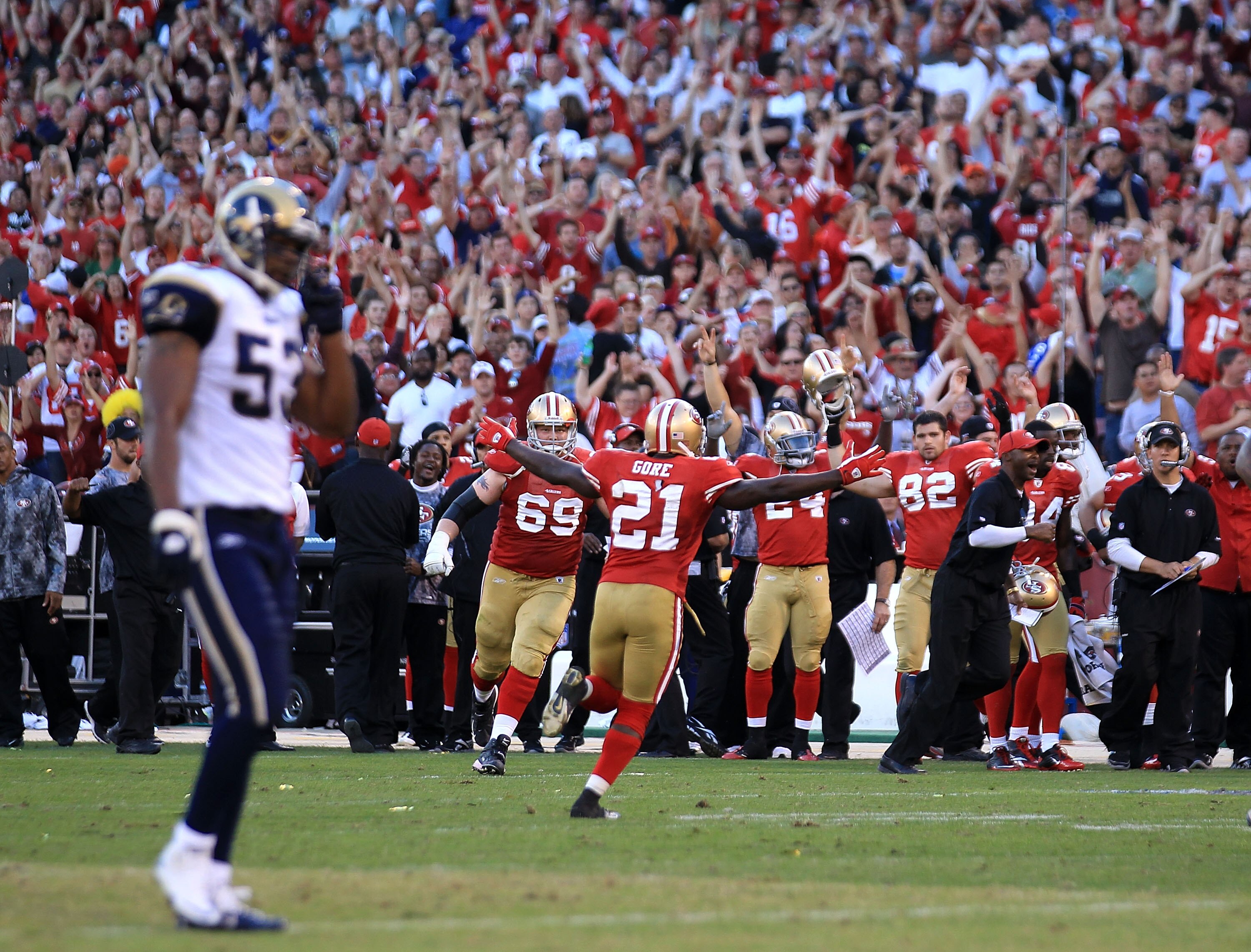 SAN FRANCISCO - NOVEMBER 14:  Frank Gore #21 of the San Francisco 49ers celebrates after a Michael Crabtree touchdown in the fourth quarter against the St. Louis Rams during an NFL game at Candlestick Park on November 14, 2010 in San Francisco, California