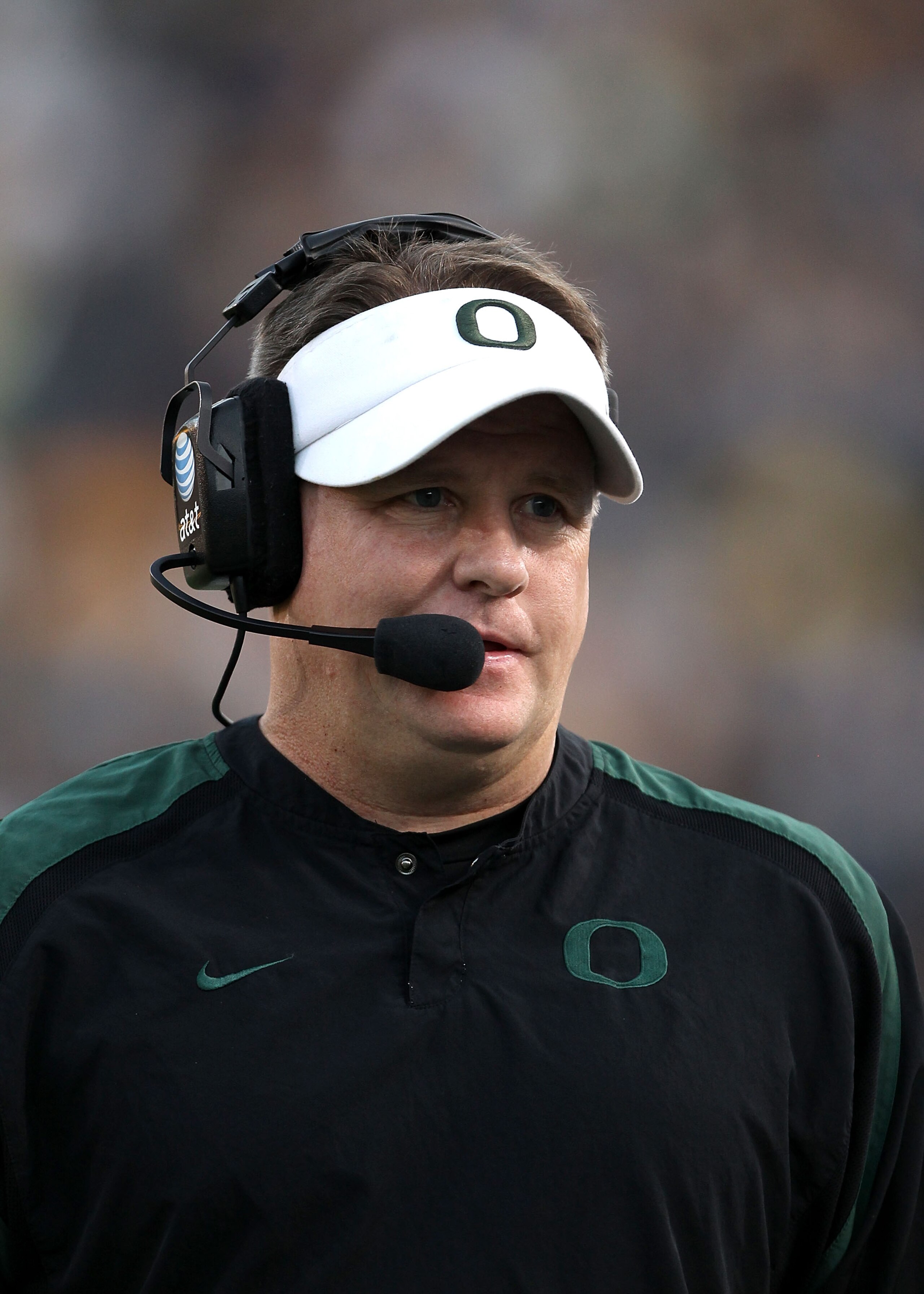 BERKELEY, CA - NOVEMBER 13: Head coach Chip Kelly of the Oregon Ducks walks the sidelines during their game against the California Golden Bears  at California Memorial Stadium on November 13, 2010 in Berkeley, California.  (Photo by Ezra Shaw/Getty Images