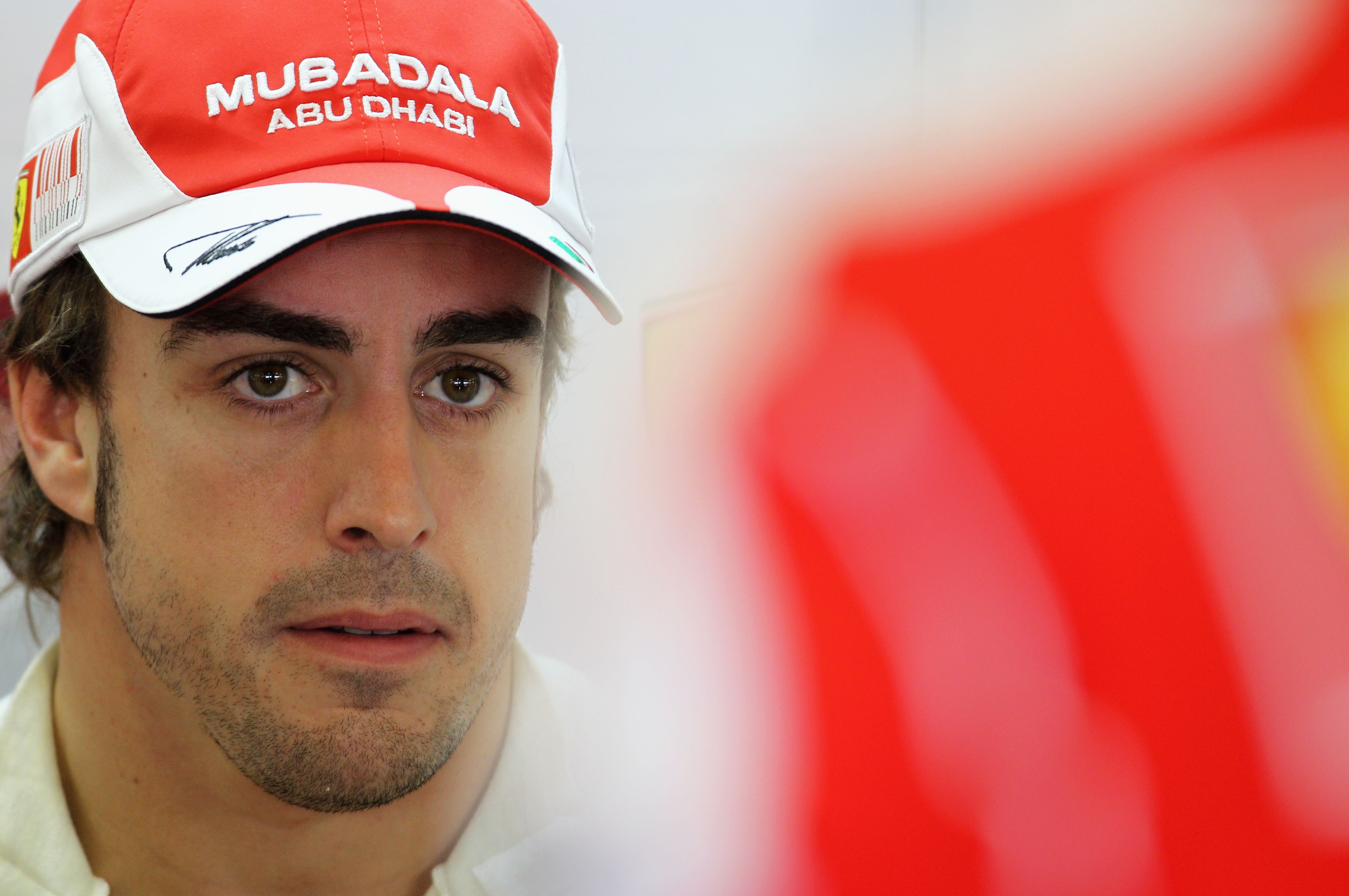 ABU DHABI, UNITED ARAB EMIRATES - NOVEMBER 12:  Fernando Alonso of Spain and Ferrari prepares to drive during practice for the Abu Dhabi Formula One Grand Prix at the Yas Marina Circuit on November 12, 2010 in Abu Dhabi, United Arab Emirates.  (Photo by P