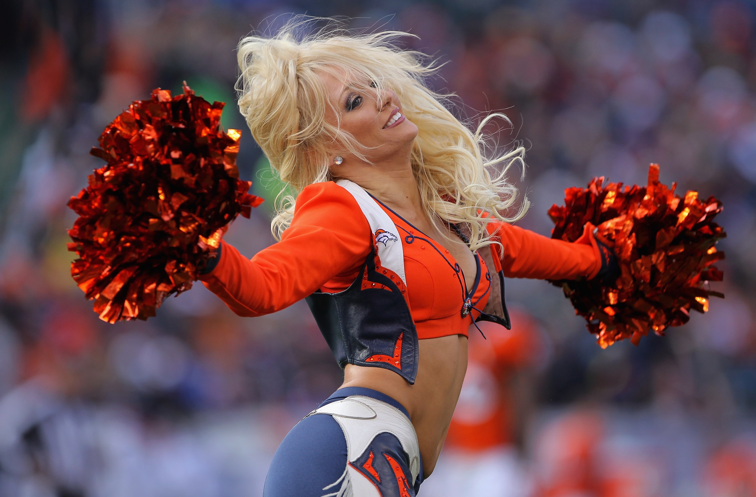 DENVER - NOVEMBER 14: A member of the Denver Bronco cheerleaders performs during a break in the action against the Kansas City Chiefs at INVESCO Field at Mile High on November 14, 2010 in Denver, Colorado. (Photo by Doug Pensinger/Getty Images) DENVER - NOVEMBER 14: A member of the Denver Bronco cheerleaders performs during a break in the action against the Kansas City Chiefs at INVESCO Field at Mile High on November 14, 2010 in Denver, Colorado. (Photo by Doug Pensinger/Getty Images)
