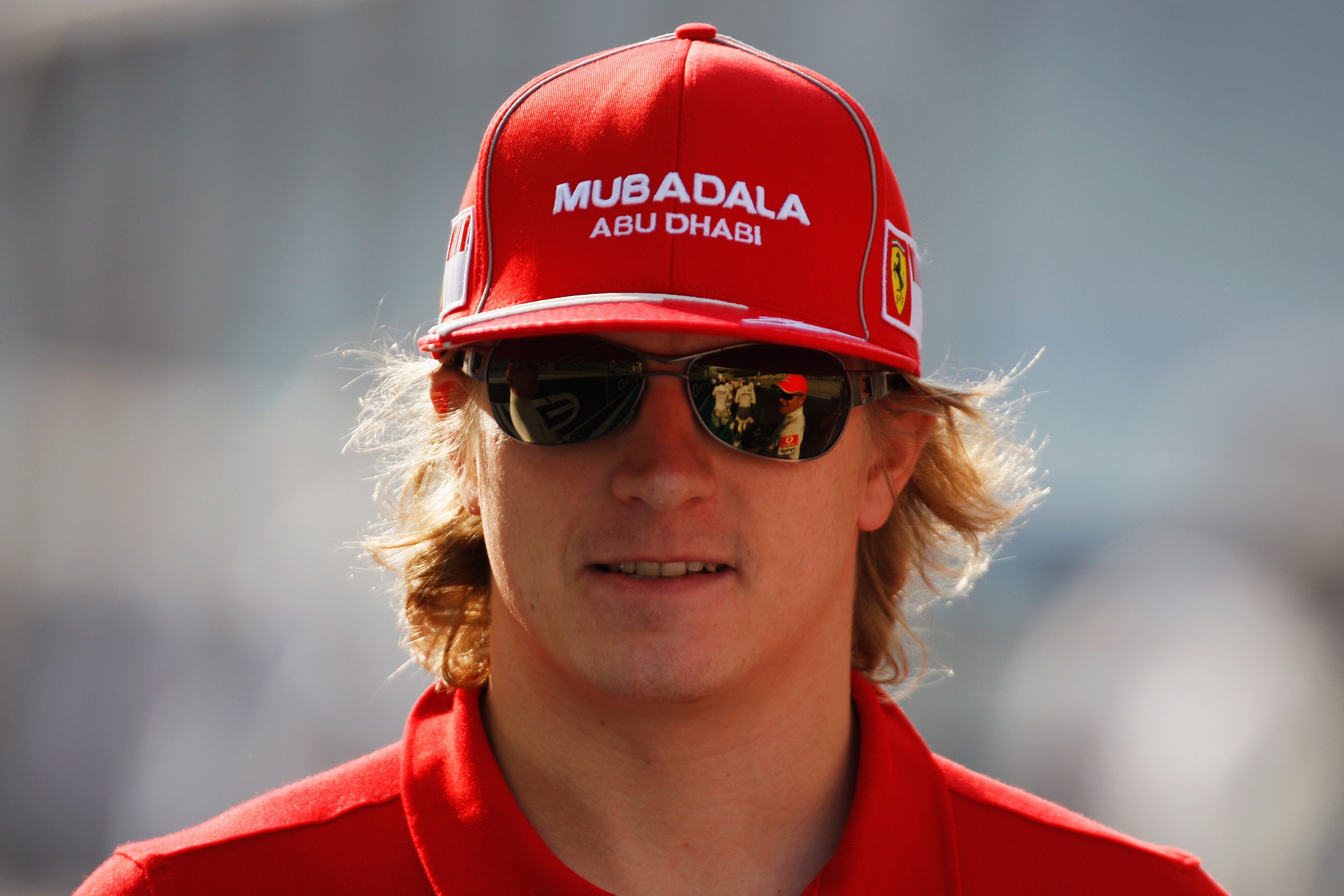 ABU DHABI, UNITED ARAB EMIRATES - NOVEMBER 01:  Kimi Raikkonen of Finland and Ferrari attends the drivers parade before the Abu Dhabi Formula One Grand Prix at the Yas Marina Circuit on November 1, 2009 in Abu Dhabi, United Arab Emirates.  (Photo by Mark