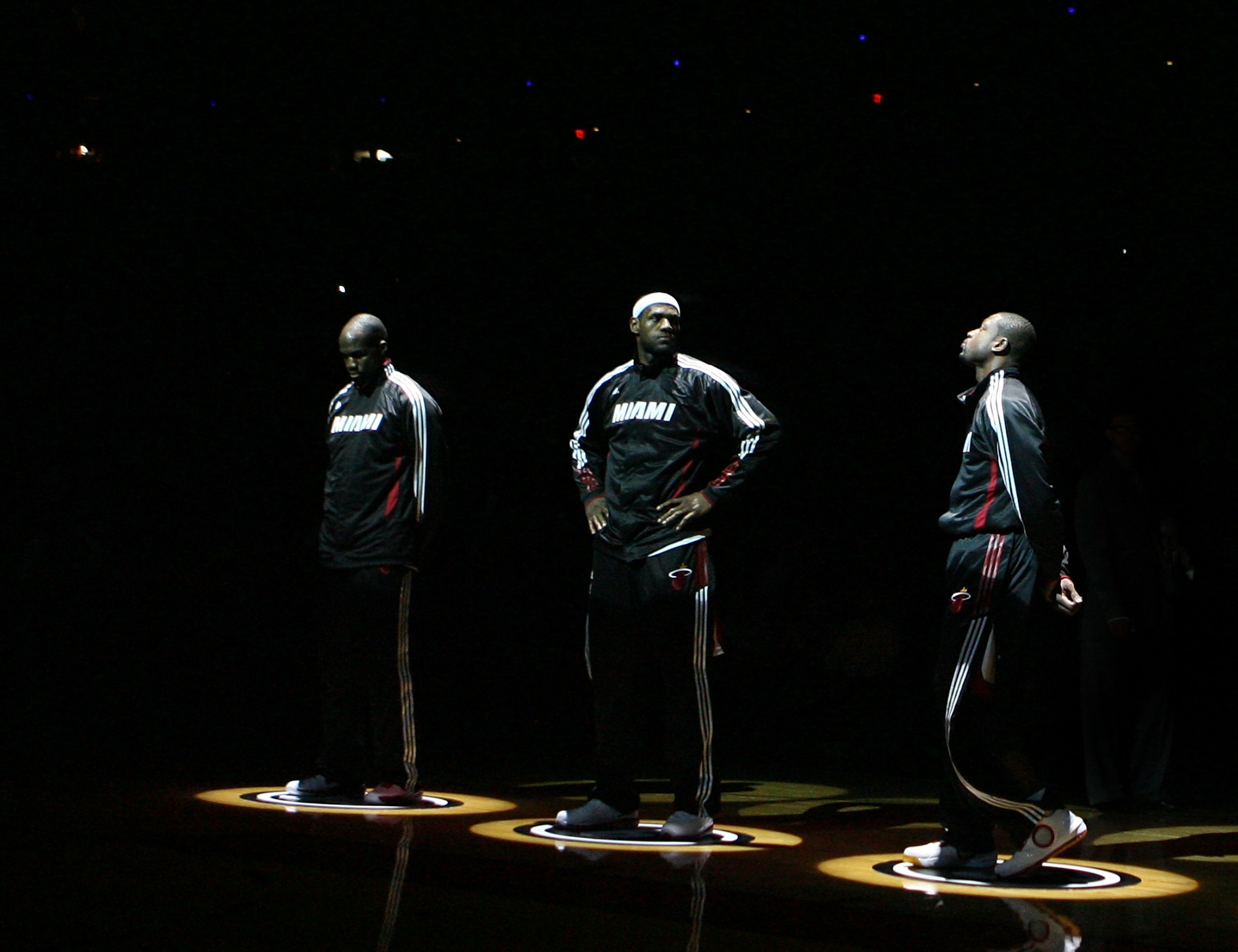MIAMI - NOVEMBER 02:  Guard Dwyane Wade #3, Chris Bosh #1, LeBron James #6 of the Miami Heat is introduced prior to taking on the Minnesota Timberwolves at American Airlines Arena on November 2, 2010 in Miami, Florida. NOTE TO USER: User expressly acknowl