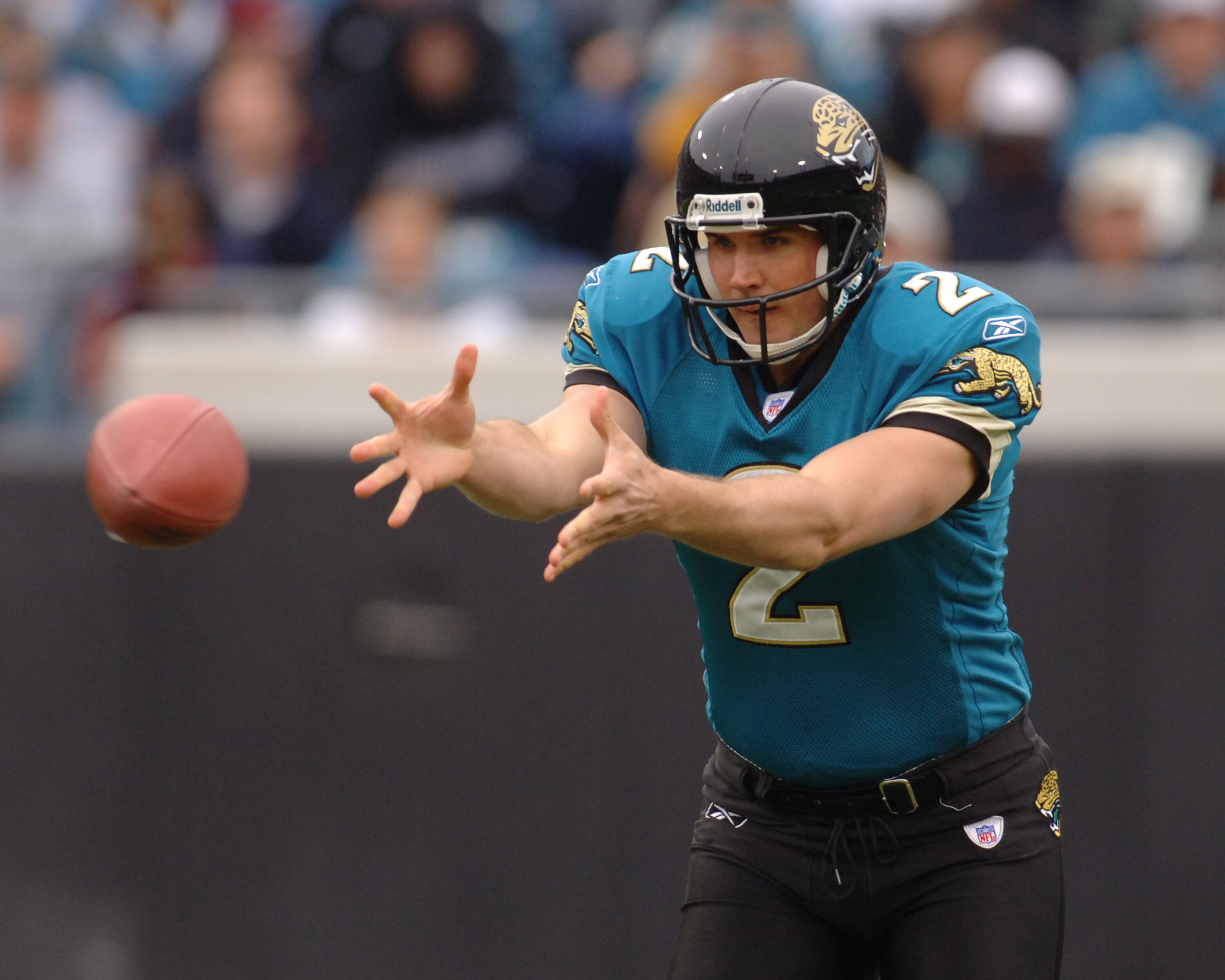 Jacksonville Jaguars punter Chris Hanson fields a snap   against the Indianapolis Colts  December 11, 2005 in Jacksonville.  The Colts defeated the Jaguars 26 - 18 to remain undefeated.  (Photo by Al Messerschmidt/Getty Images)