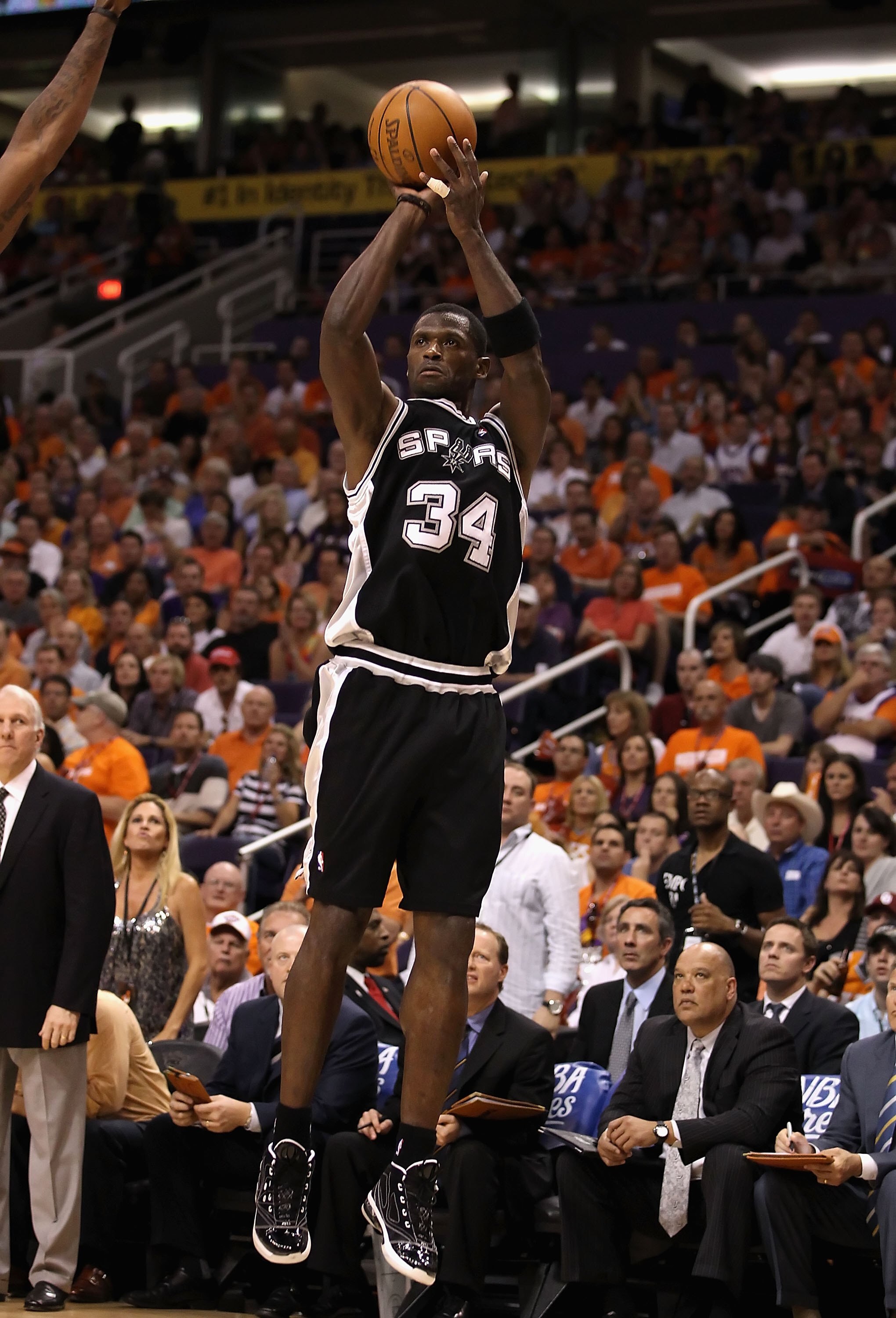 PHOENIX - MAY 05:  Antonio McDyess #34 of the San Antonio Spurs puts up a shot during Game Two of the Western Conference Semifinals of the 2010 NBA Playoffs against the Phoenix Suns at US Airways Center on May 5, 2010 in Phoenix, Arizona. The team is wear