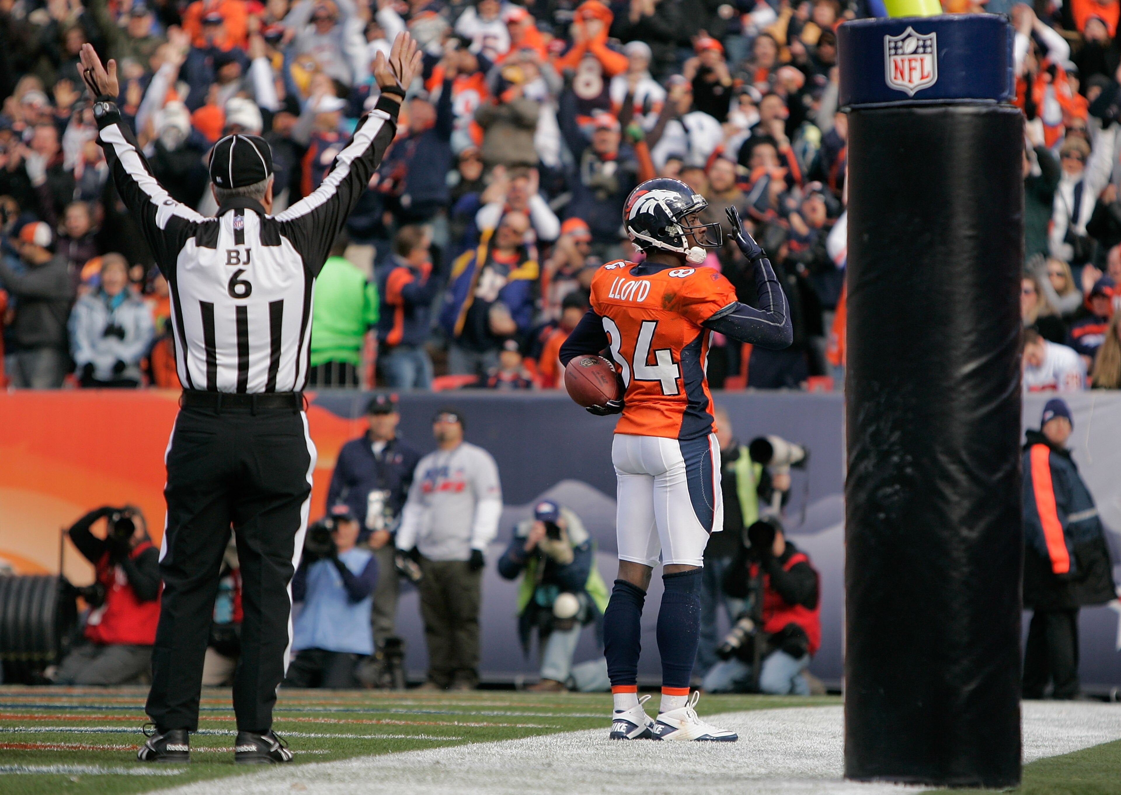 DENVER - NOVEMBER 14: Wide receiver Brandon Lloyd #84 of the Denver Broncos celebrates 6-yard touchdown reception against the Kansas City Chiefs during the first quarter at INVESCO Field at Mile High on November 14, 2010 in Denver, Colorado. The Denver B DENVER - NOVEMBER 14: Wide receiver Brandon Lloyd #84 of the Denver Broncos celebrates 6-yard touchdown reception against the Kansas City Chiefs during the first quarter at INVESCO Field at Mile High on November 14, 2010 in Denver, Colorado. The Denver B