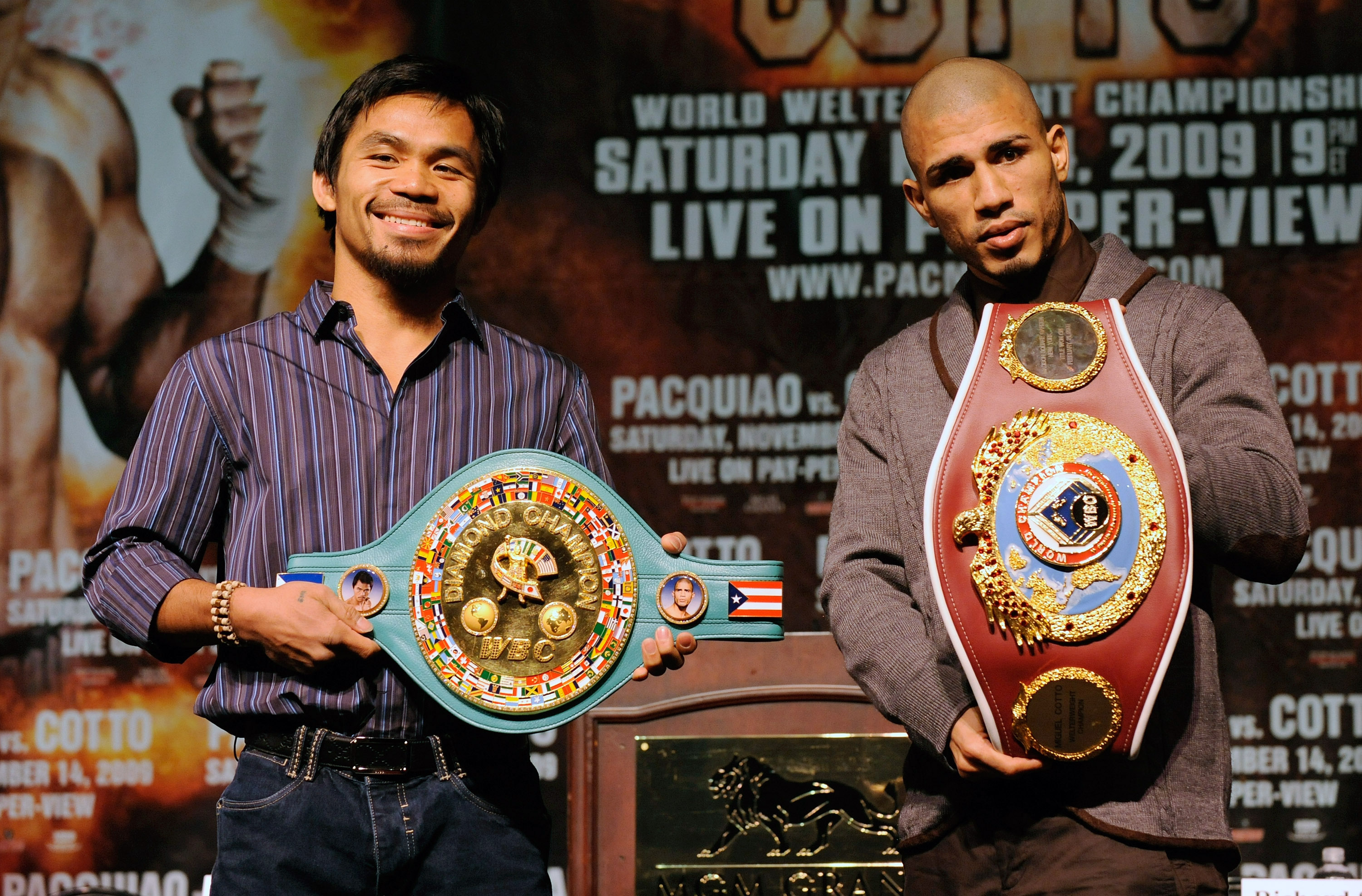 LAS VEGAS - NOVEMBER 11:  Boxer Manny Pacquiao (L) and WBO welterweight champion Miguel Cotto pose during the final news conference for their bout at the MGM Grand Hotel/Casino November 11, 2009 in Las Vegas, Nevada. Pacquiao and Cotto will meet in a WBO