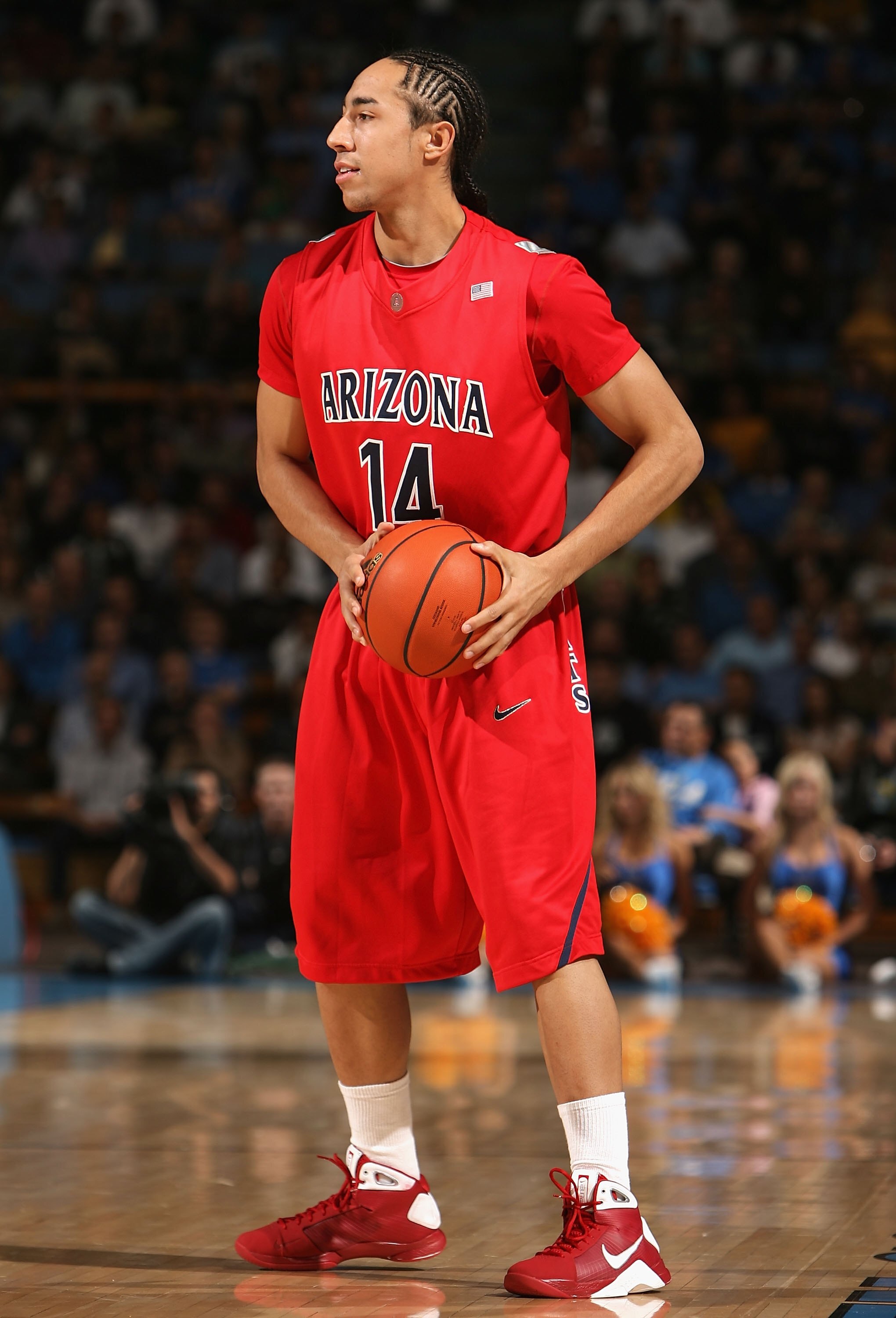WESTWOOD, CA - JANUARY 15:  Brendon Lavender #14 of the Arizona Wildcats looks to pass the ball during the college basketball game against the UCLA Bruins at Pauley Pavilion on January 15, 2009 in Westwood, California. The Bruins defeated the Wildcats 83-