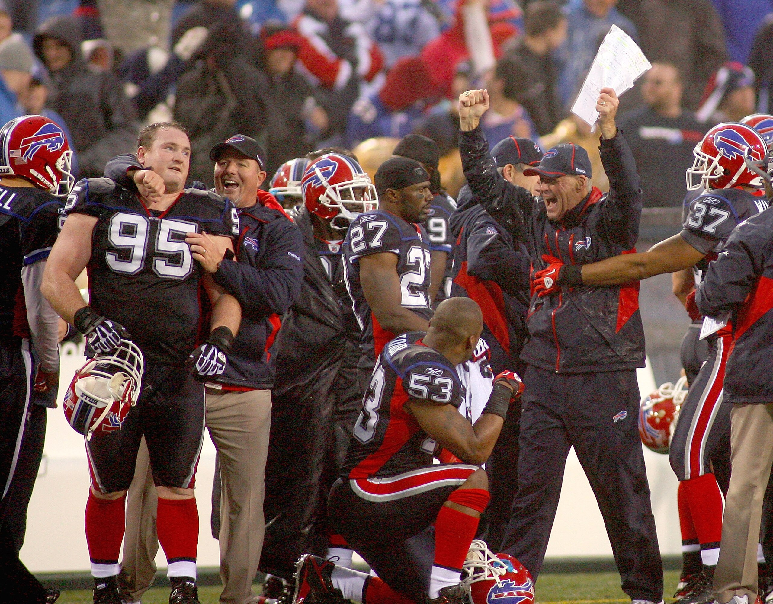 ORCHARD PARK, NY - NOVEMBER 14: Members of the Buffalo Bills celebrate after winning their first game of the season against the Detroit Lions at Ralph Wilson Stadium on November 14, 2010 in Orchard Park, New York. Buffalo won 14-12. (Photo by Rick Stewart