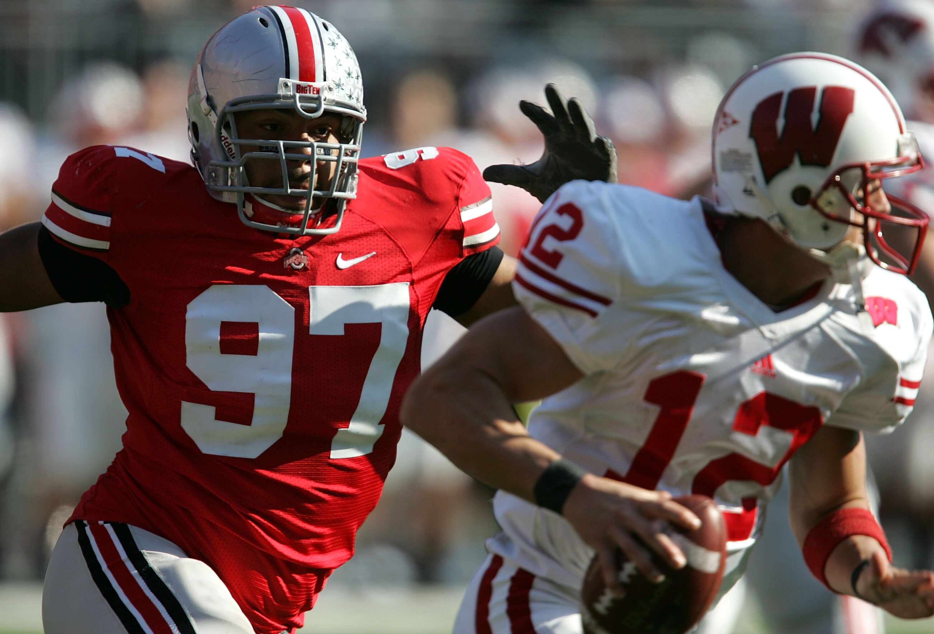 COLUMBUS, OH - NOVEMBER 03: Cameron Heyward #97 of the Ohio State Buckeyes chases down Tyler Donovan #12 of the Wisconsin Badgers on November 3, 2007 at Ohio Stadium in Columbus, Ohio. Ohio State defeated Wisconsin 38-17. (Photo by Jonathan Daniel/Getty I