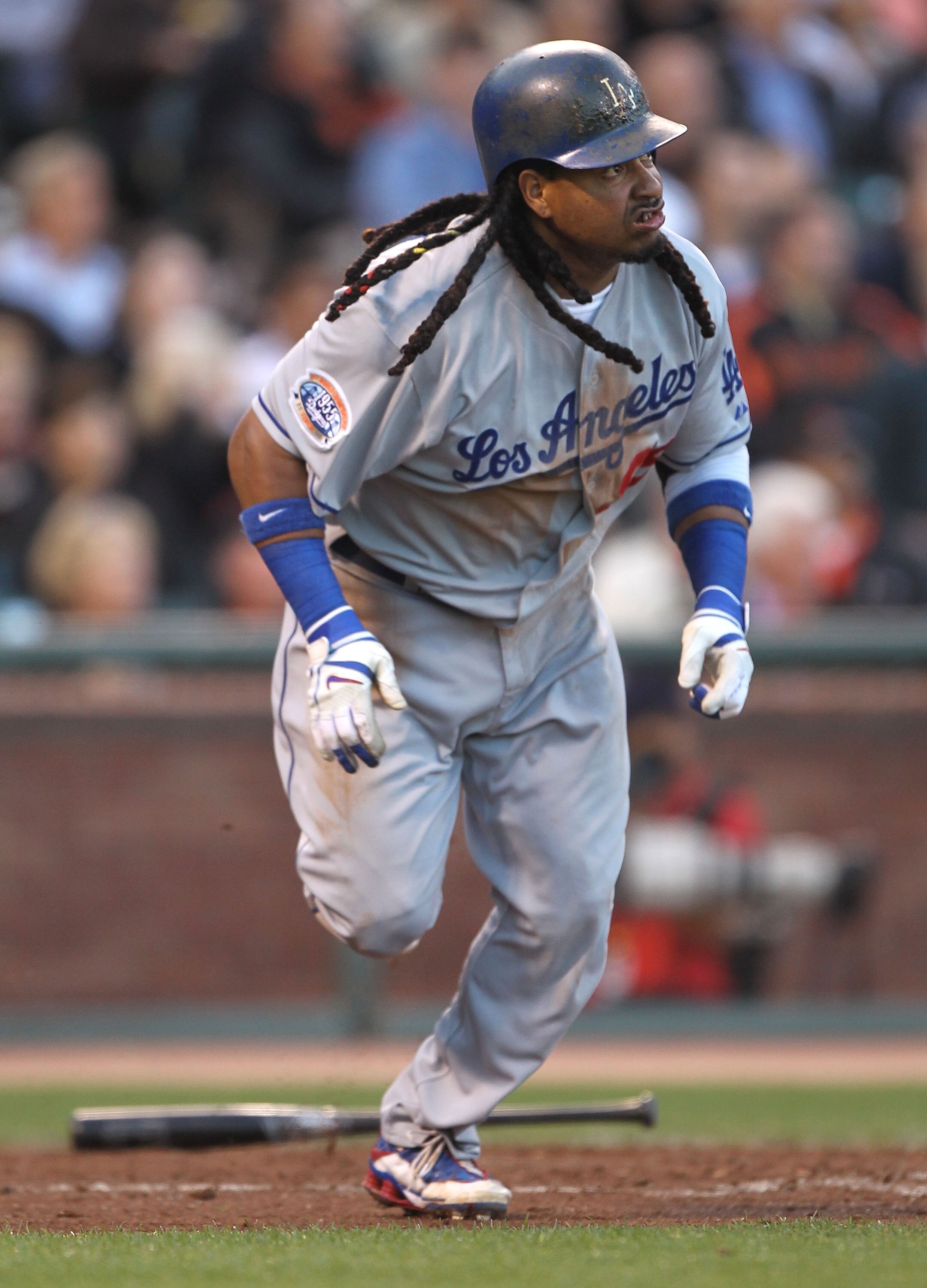 SAN FRANCISCO - JUNE 28:  Manny Ramirez #99 of the Los Angeles Dodgers hits an RBI double in the third inning against the San Francisco Giants during an MLB game at AT&T Park on June 28, 2010 in San Francisco, California.  (Photo by Jed Jacobsohn/Getty Im