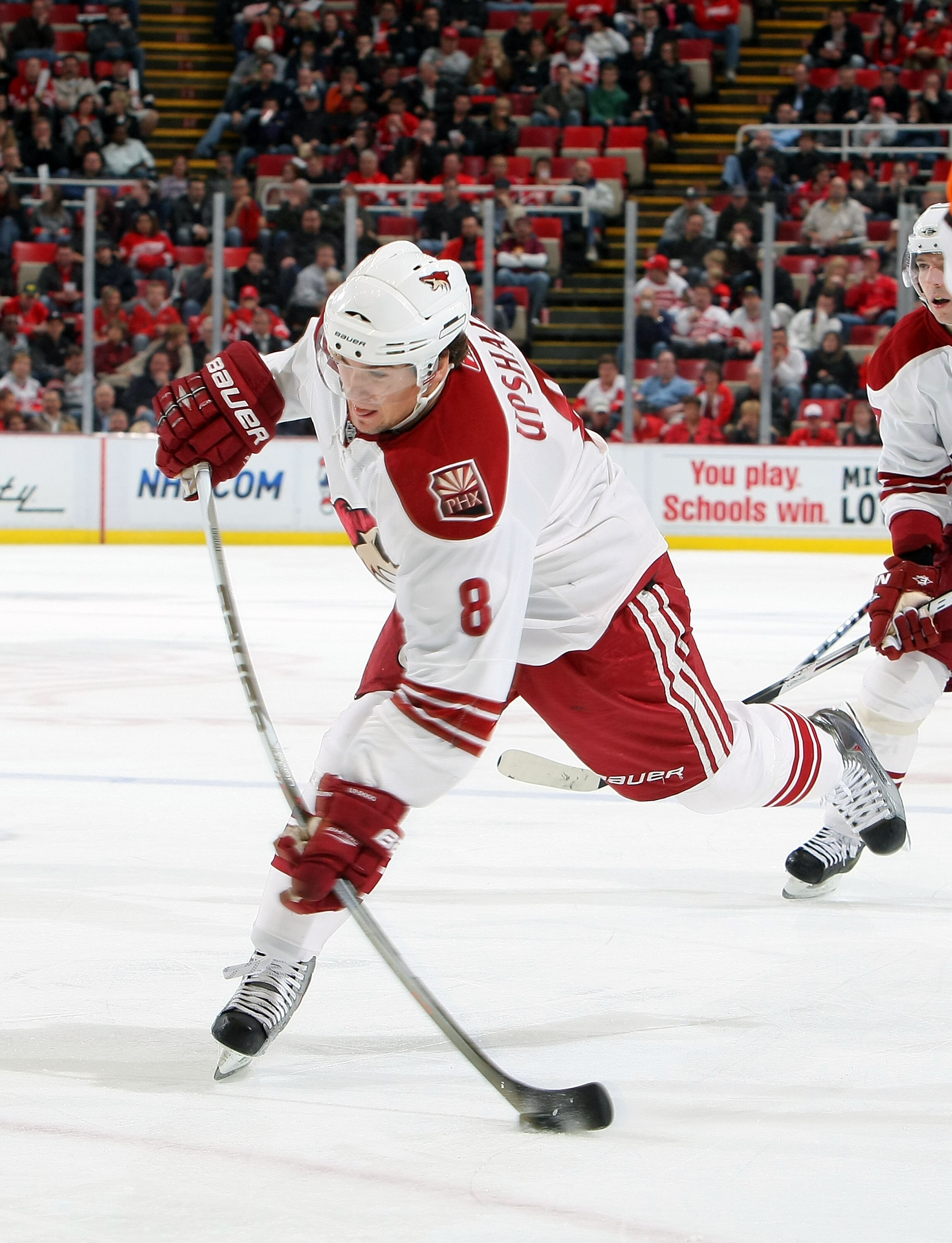 DETROIT - OCTOBER 28:  Scottie Upshall #8 of the Phoenix Coyotes takes a shot against the Detroit Red Wings during their NHL game at Joe Louis Arena on October 28, 2010 in Detroit, Michigan.(Photo By Dave Sandford/Getty Images)
