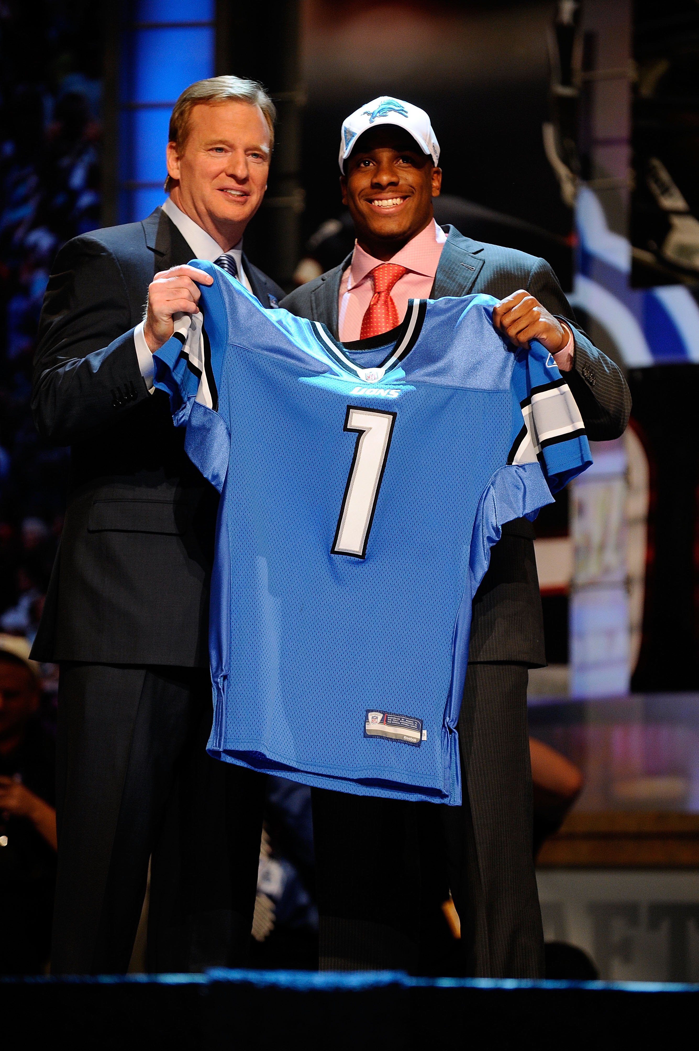 NEW YORK - APRIL 22:  Jahvid Best (R) from the California Golden Bears poses with NFL Commissioner Roger Goodell as they hold up a Detroit Lions jersey after the Lions selected Best number 30 overall during the first round of the 2010 NFL Draft at Radio C