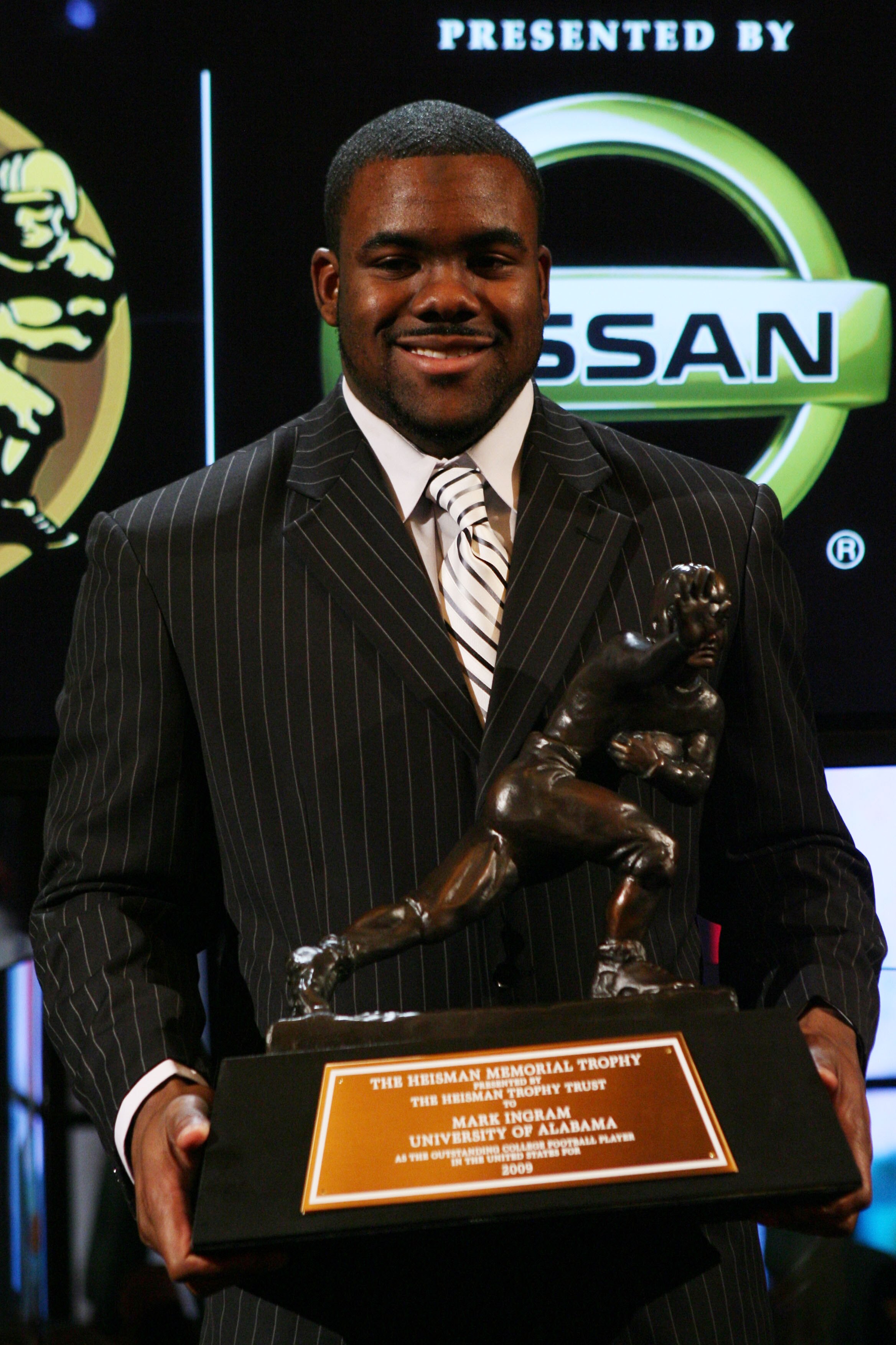 NEW YORK - DECEMBER 12:  Running back Mark Ingram #22 of the Alabama Crimson Tide poses with the Heisman Trophy during a press conference after being named the 75th Heisman Trophy winner at the Marriott Marquis on December 12, 2009 in New York City.  (Pho