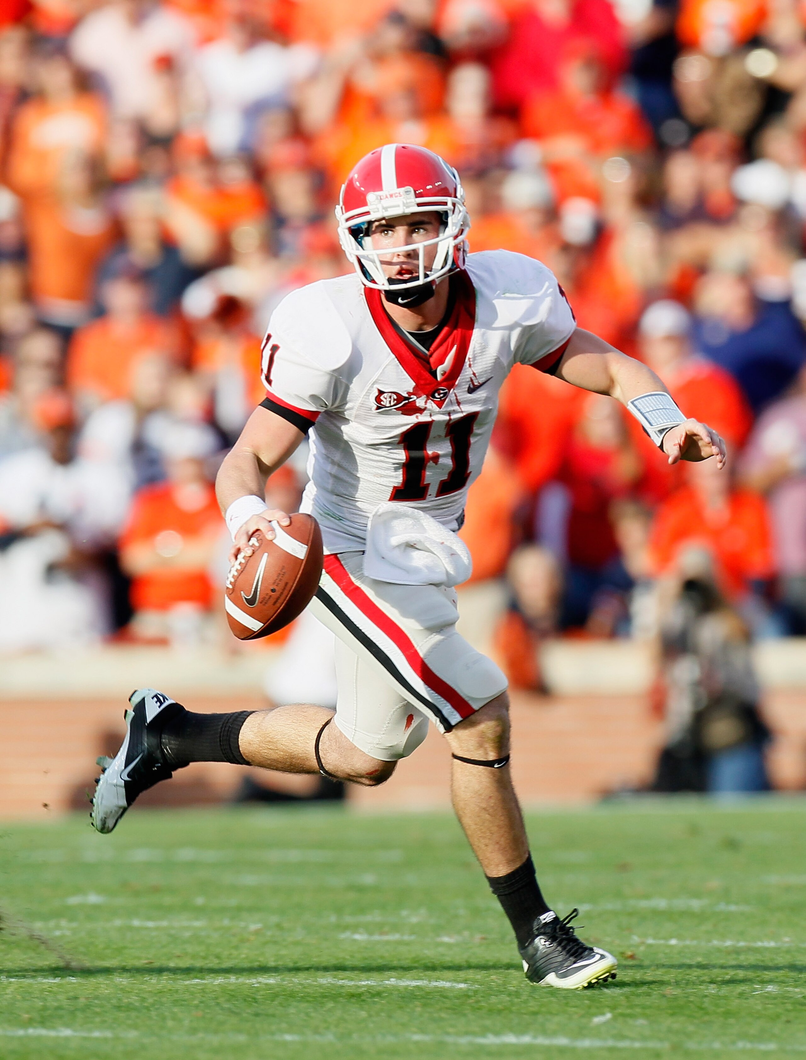 AUBURN, AL - NOVEMBER 13:  Quarterback Aaron Murray #11 of the Georgia Bulldogs rushes out of the pocket against the Auburn Tigers at Jordan-Hare Stadium on November 13, 2010 in Auburn, Alabama.  (Photo by Kevin C. Cox/Getty Images)