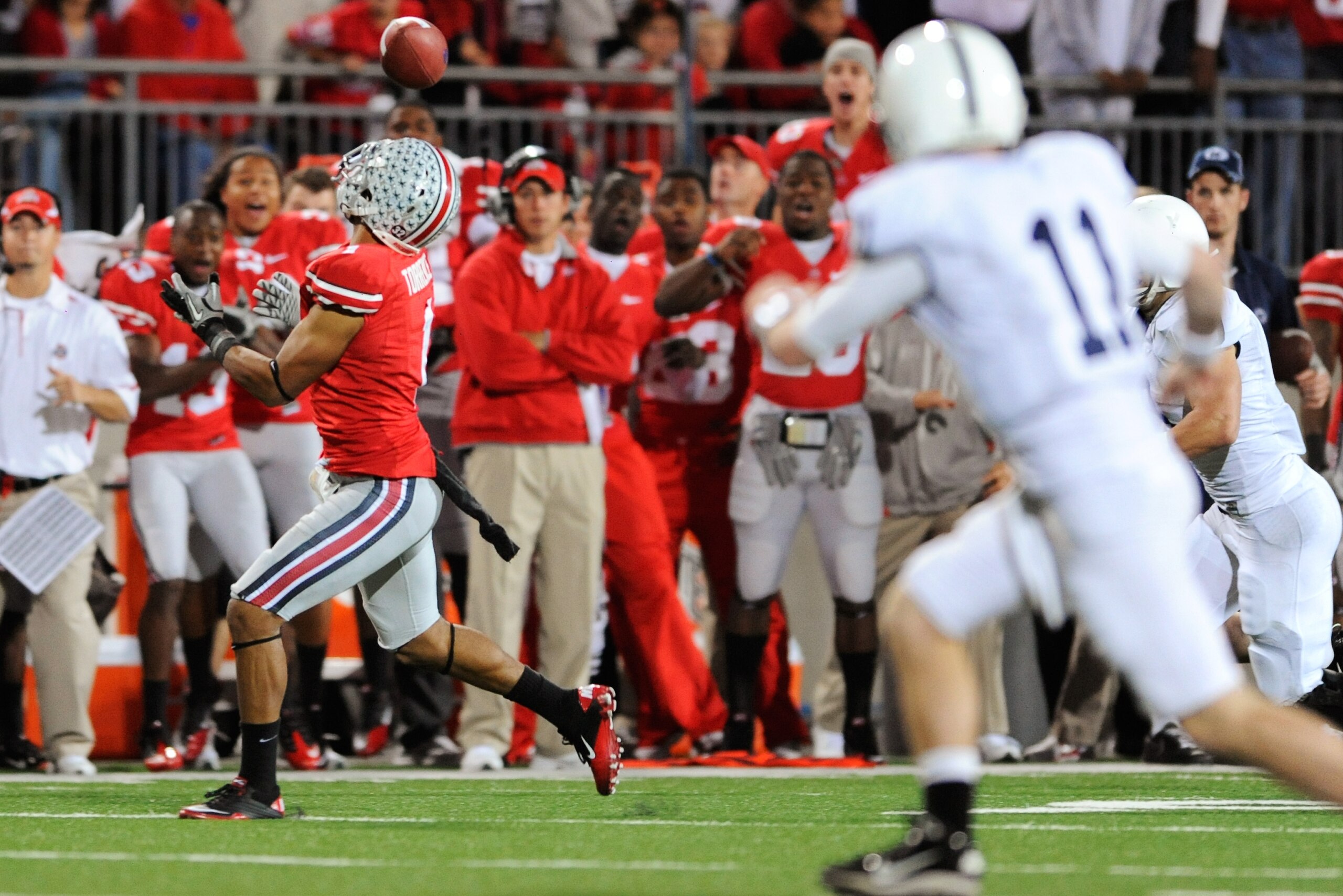 COLUMBUS, OH - NOVEMBER 13: Devon Torrence #1 of the Ohio State Buckeyes intercepts a pass in the third quarter against the Penn State Nittany Lions at Ohio Stadium on November 13, 2010 in Columbus, Ohio. Torrence returned the interception 34-yards for a COLUMBUS, OH - NOVEMBER 13: Devon Torrence #1 of the Ohio State Buckeyes intercepts a pass in the third quarter against the Penn State Nittany Lions at Ohio Stadium on November 13, 2010 in Columbus, Ohio. Torrence returned the interception 34-yards for a