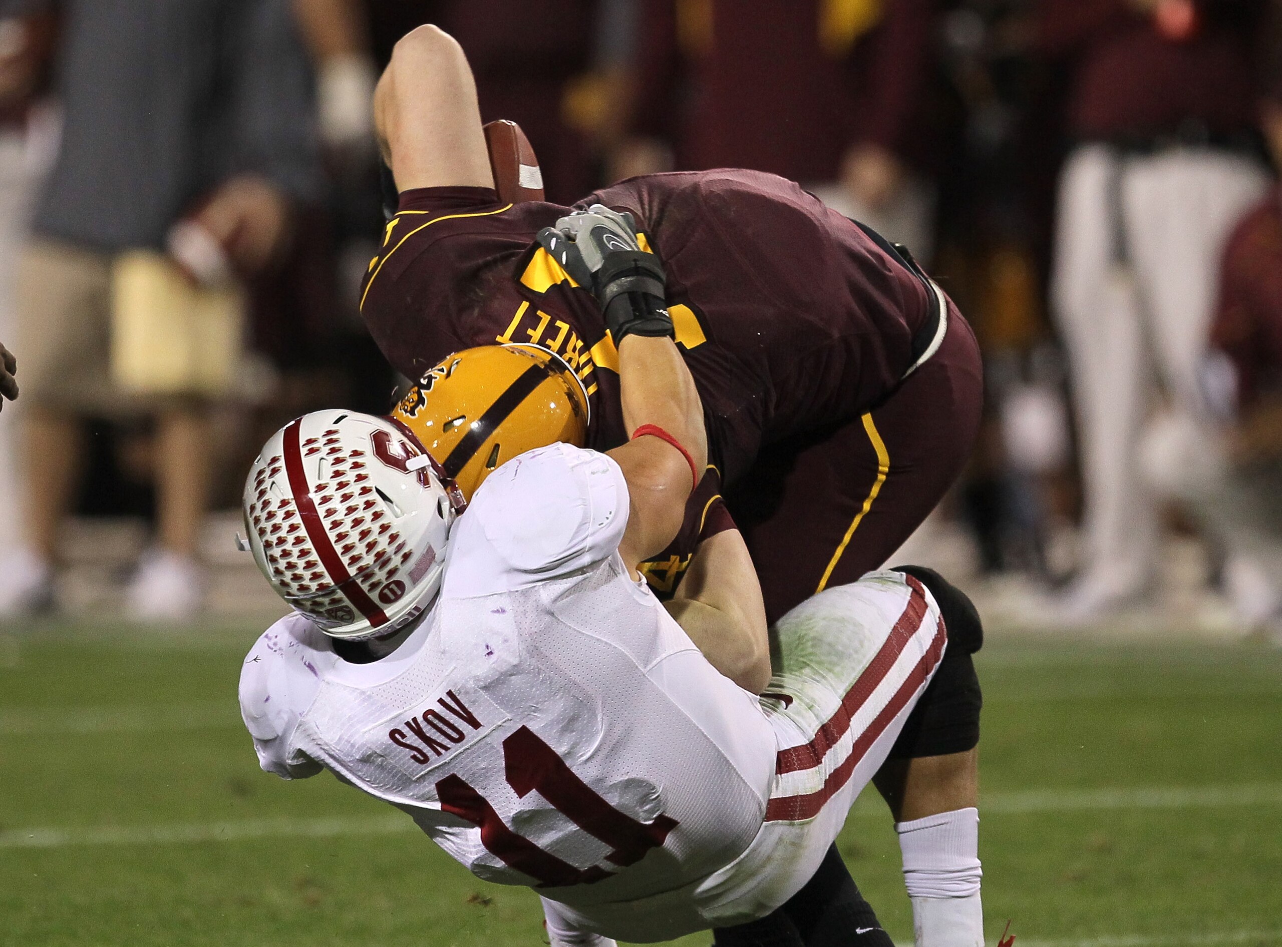 TEMPE, AZ - NOVEMBER 13: Linebacker Shane Skov #11 of the Stanford Cardinal sacks quarterback Steven Threet #14 of the Arizona State Sun Devils to end the Sun Devils' final drive attempt in the fourth quarter at Sun Devil Stadium on November 13, 2010 in TEMPE, AZ - NOVEMBER 13: Linebacker Shane Skov #11 of the Stanford Cardinal sacks quarterback Steven Threet #14 of the Arizona State Sun Devils to end the Sun Devils' final drive attempt in the fourth quarter at Sun Devil Stadium on November 13, 2010 in