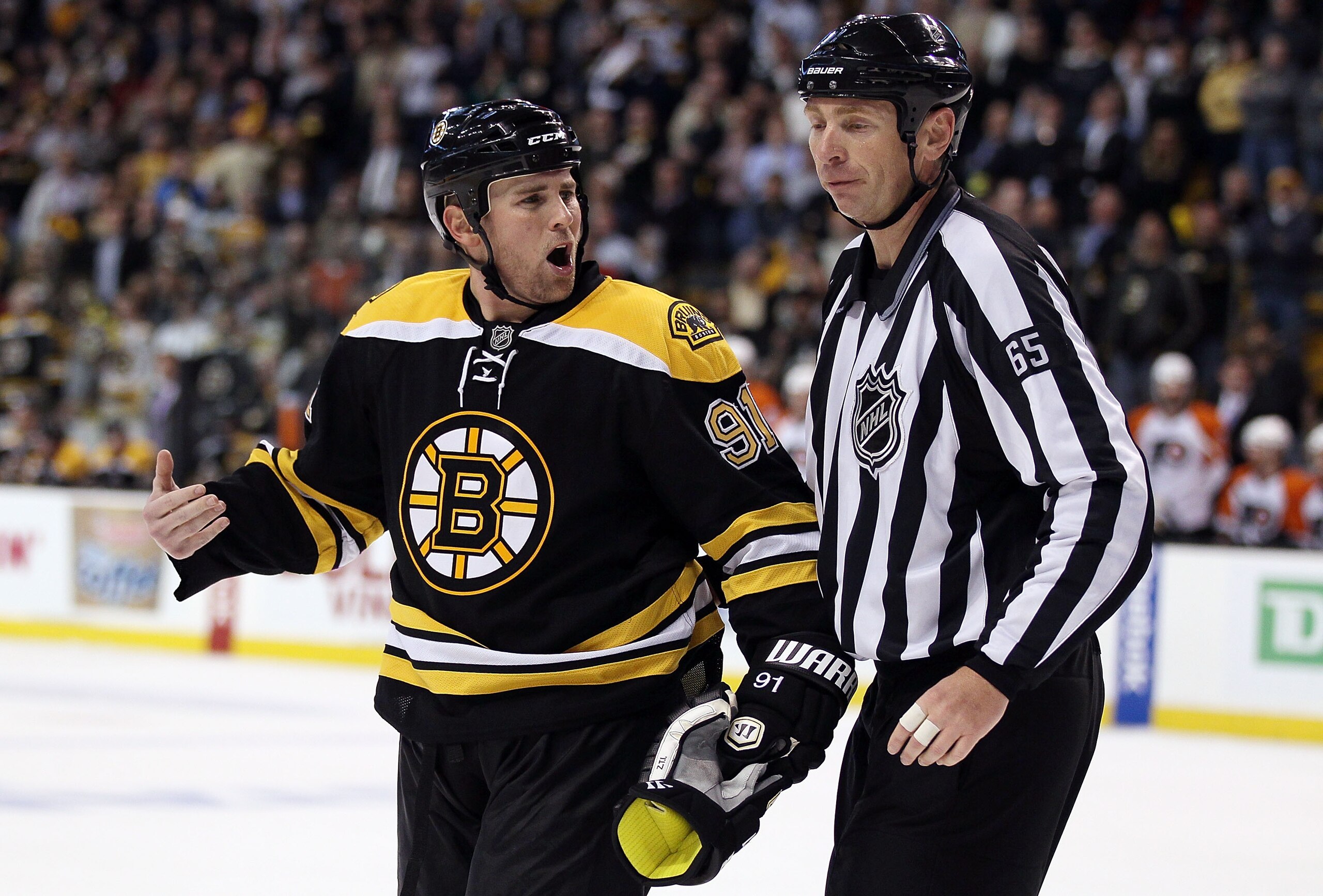 BOSTON - MAY 10:  Marc Savard #91 of the Boston Bruins reacts after he is called for a penalty in the third period against the Philadelphia Flyers in Game Five of the Eastern Conference Semifinals during the 2010 NHL Stanley Cup Playoffs at TD Garden on M