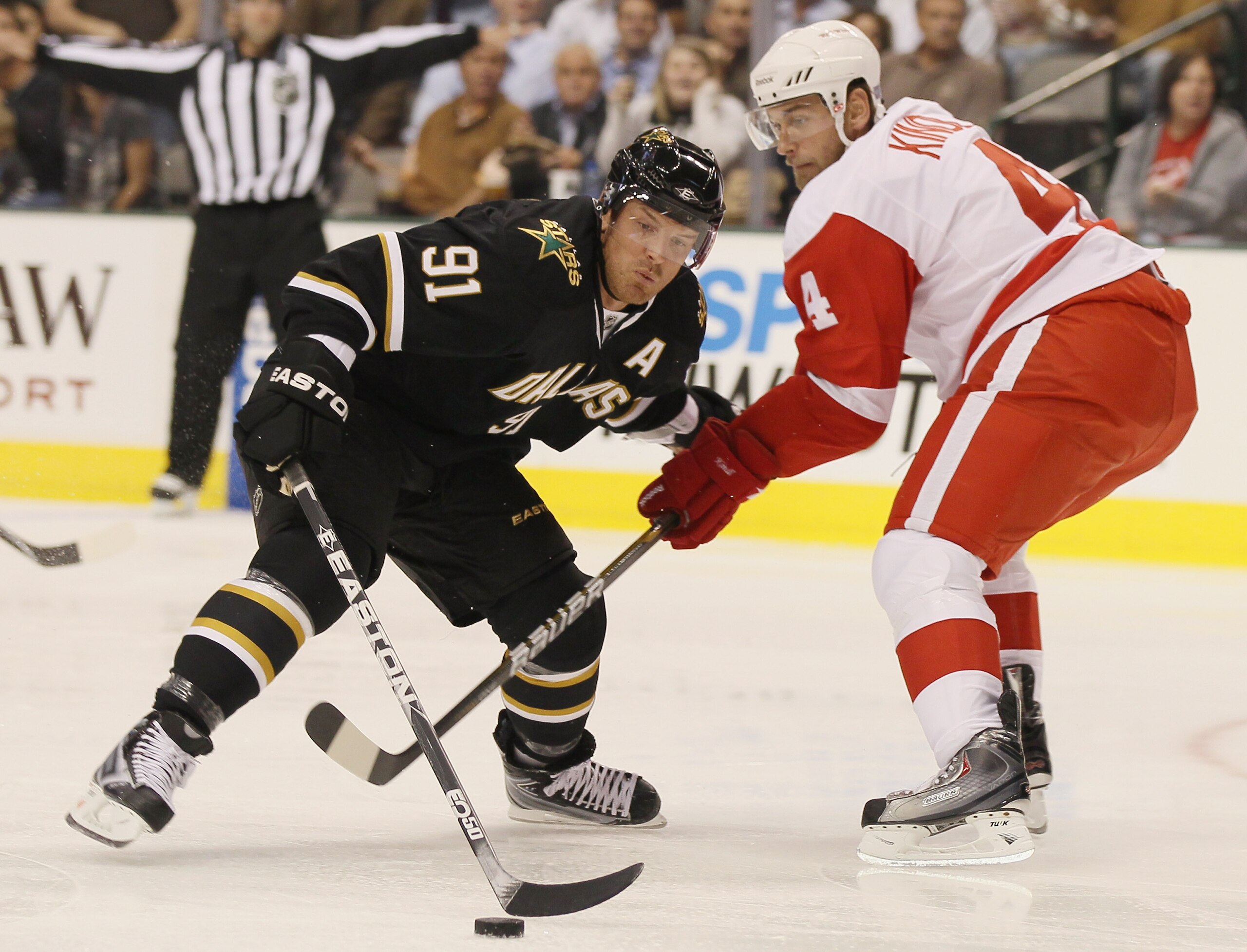 DALLAS - OCTOBER 14:  Brad Richards #91 of the Dallas Stars heads for the net as Jakub Kindl #4 of the Detroit Red Wings defends on October 14, 2010 at the American Airlines Center in Dallas, Texas.  (Photo by Elsa/Getty Images)