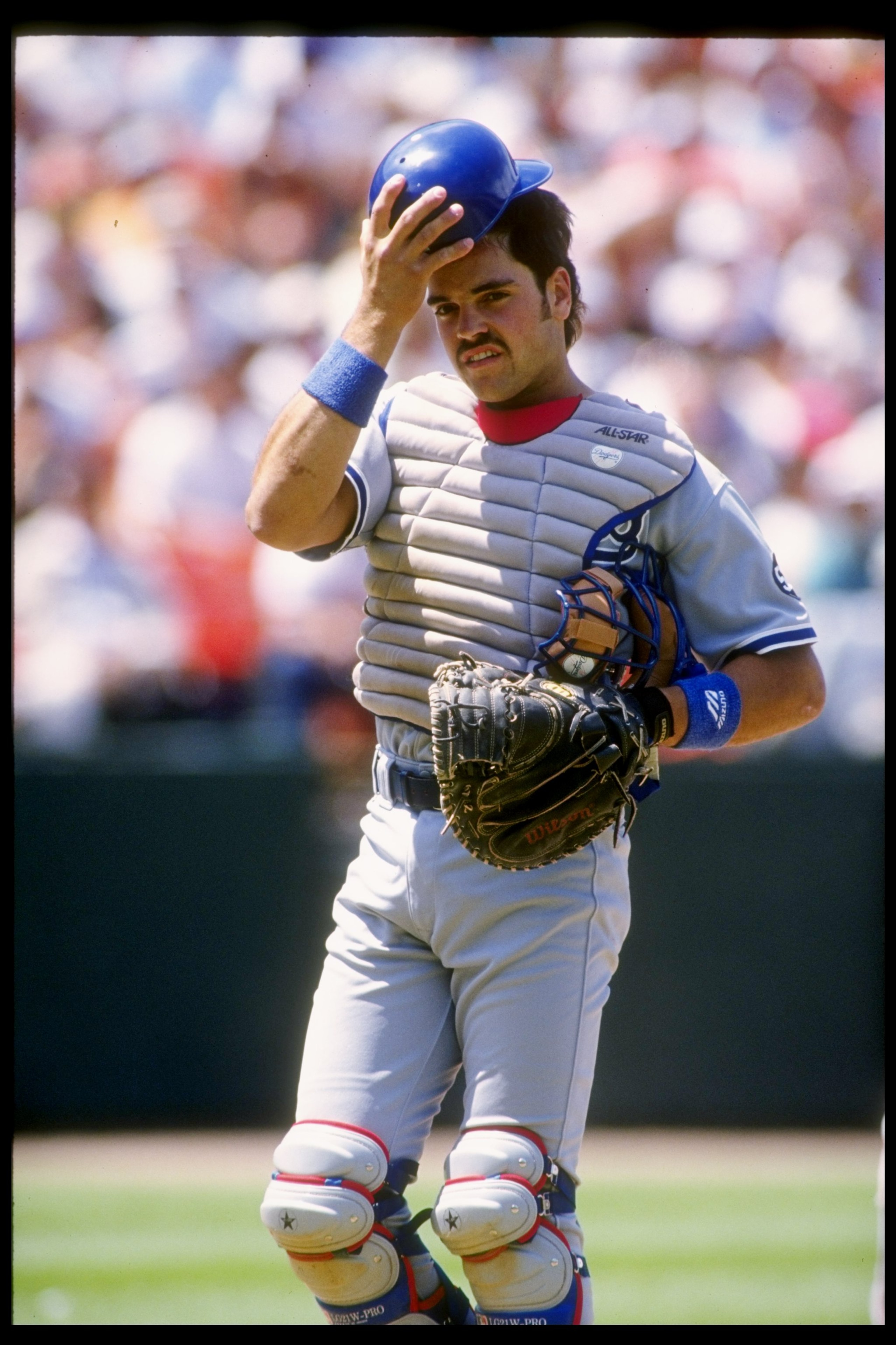 28 Jul 1993:  Catcher Mike Piazza of the Los Angeles Dodgers looks on during a game against the San Francisco Giants at Candlestick Park in San Francisco, California. Mandatory Credit: Otto Greule  /Allsport