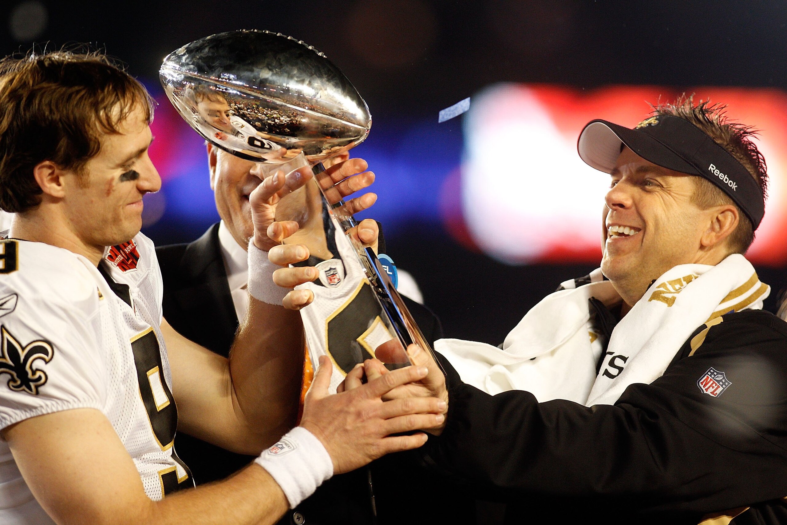 MIAMI GARDENS, FL - FEBRUARY 07: Head coach Sean Payton of the New Orleans Saints hands quarterback Drew Brees #9 the Vince Lombardi trophy after defeating the Indianapolis Colts during Super Bowl XLIV on February 7, 2010 at Sun Life Stadium in Miami Gar MIAMI GARDENS, FL - FEBRUARY 07: Head coach Sean Payton of the New Orleans Saints hands quarterback Drew Brees #9 the Vince Lombardi trophy after defeating the Indianapolis Colts during Super Bowl XLIV on February 7, 2010 at Sun Life Stadium in Miami Gar