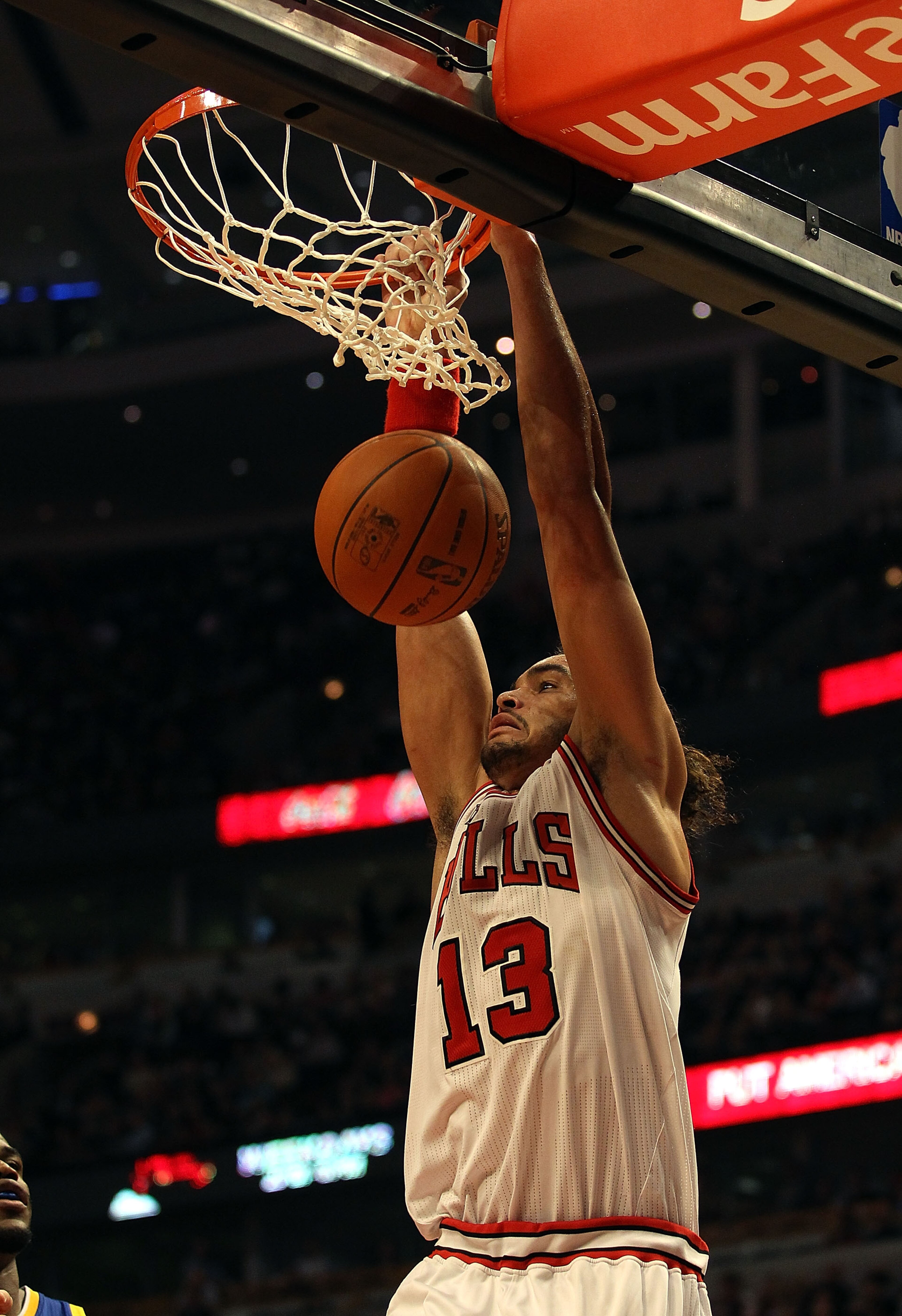 CHICAGO - NOVEMBER 11: Joakim Noah #13 of the Chicago Bulls dunks the ball against the Golden State Warriors at the United Center on November 11, 2010 in Chicago, Illinois. The Bulls defeated the Warriors 120-90. NOTE TO USER: User expressly acknowledges