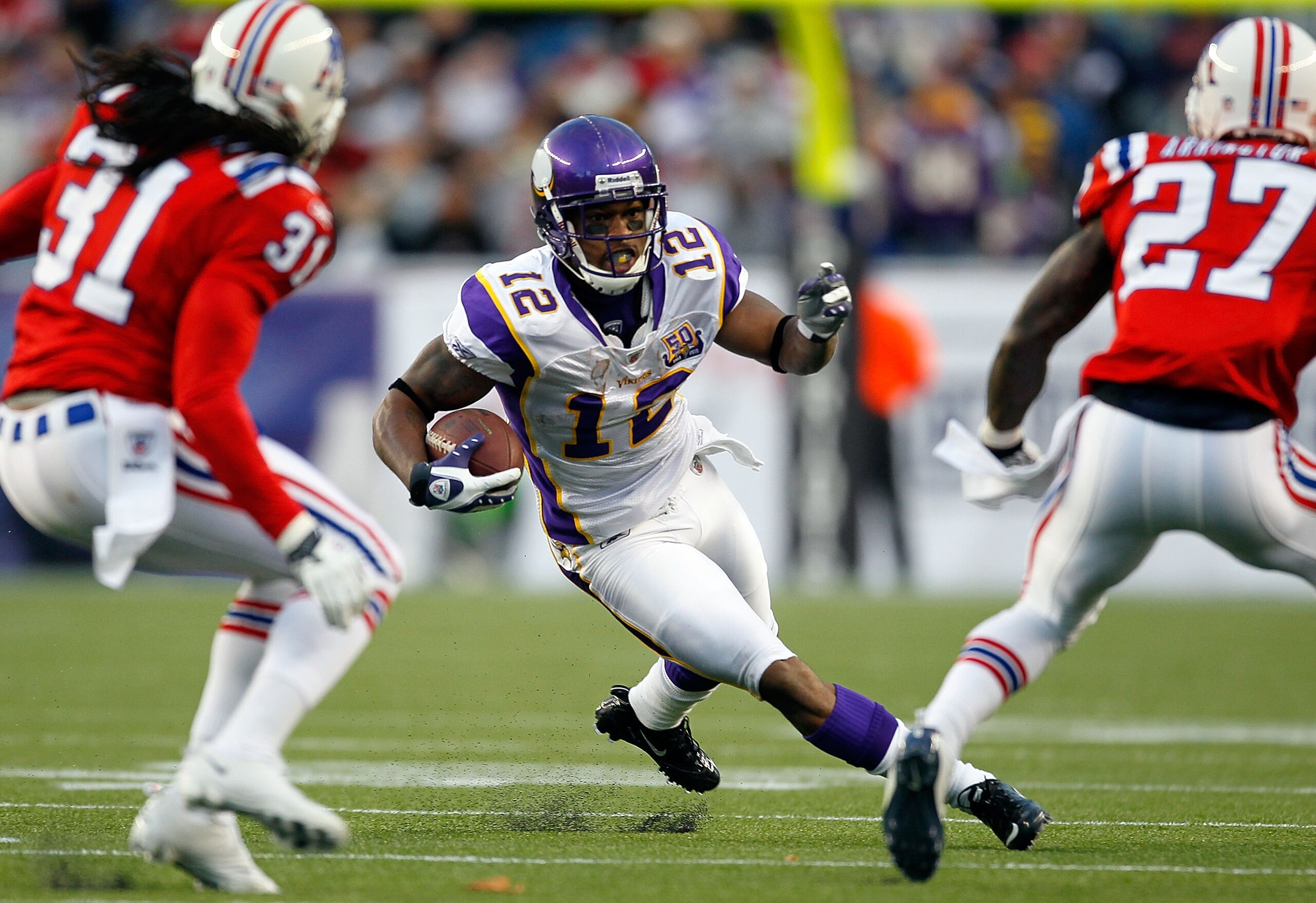 FOXBORO, MA - OCTOBER 31: Percy Harvin #12 of the Minnesota Vikings gains yardage against the New England Patriots at Gillette Stadium on October 31, 2010 in Foxboro, Massachusetts. (Photo by Jim Rogash/Getty Images) FOXBORO, MA - OCTOBER 31: Percy Harvin #12 of the Minnesota Vikings gains yardage against the New England Patriots at Gillette Stadium on October 31, 2010 in Foxboro, Massachusetts. (Photo by Jim Rogash/Getty Images)
