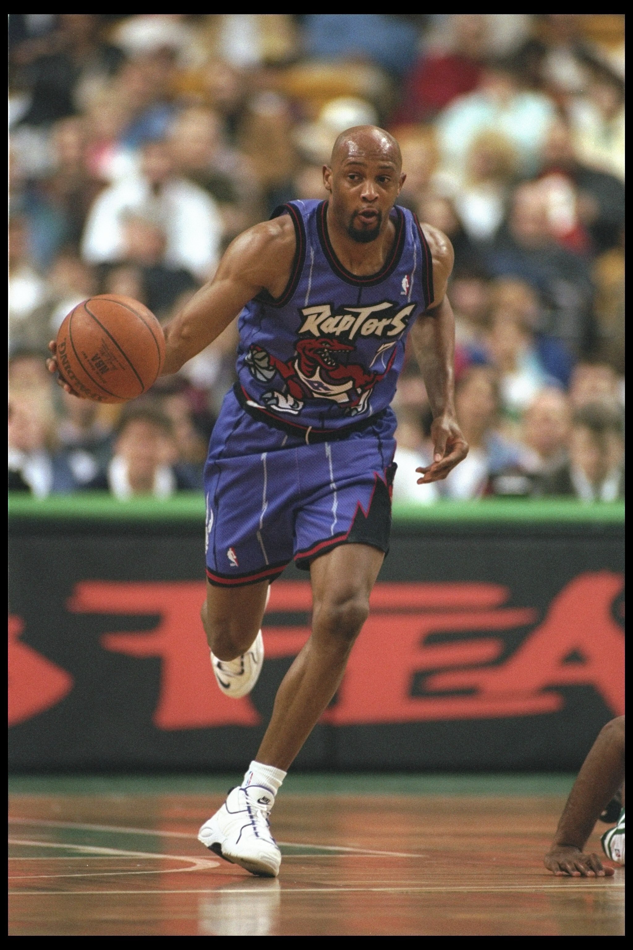 12 Apr 1996:  Guard Alvin Robertson of the Toronto Raptors moves the ball against the Boston Celtics during a game played at the Fleet Center in Boston, Massachusetts.  The Celtics won the game, 136-108. Mandatory Credit: ALLSPORT USA  /Allsport