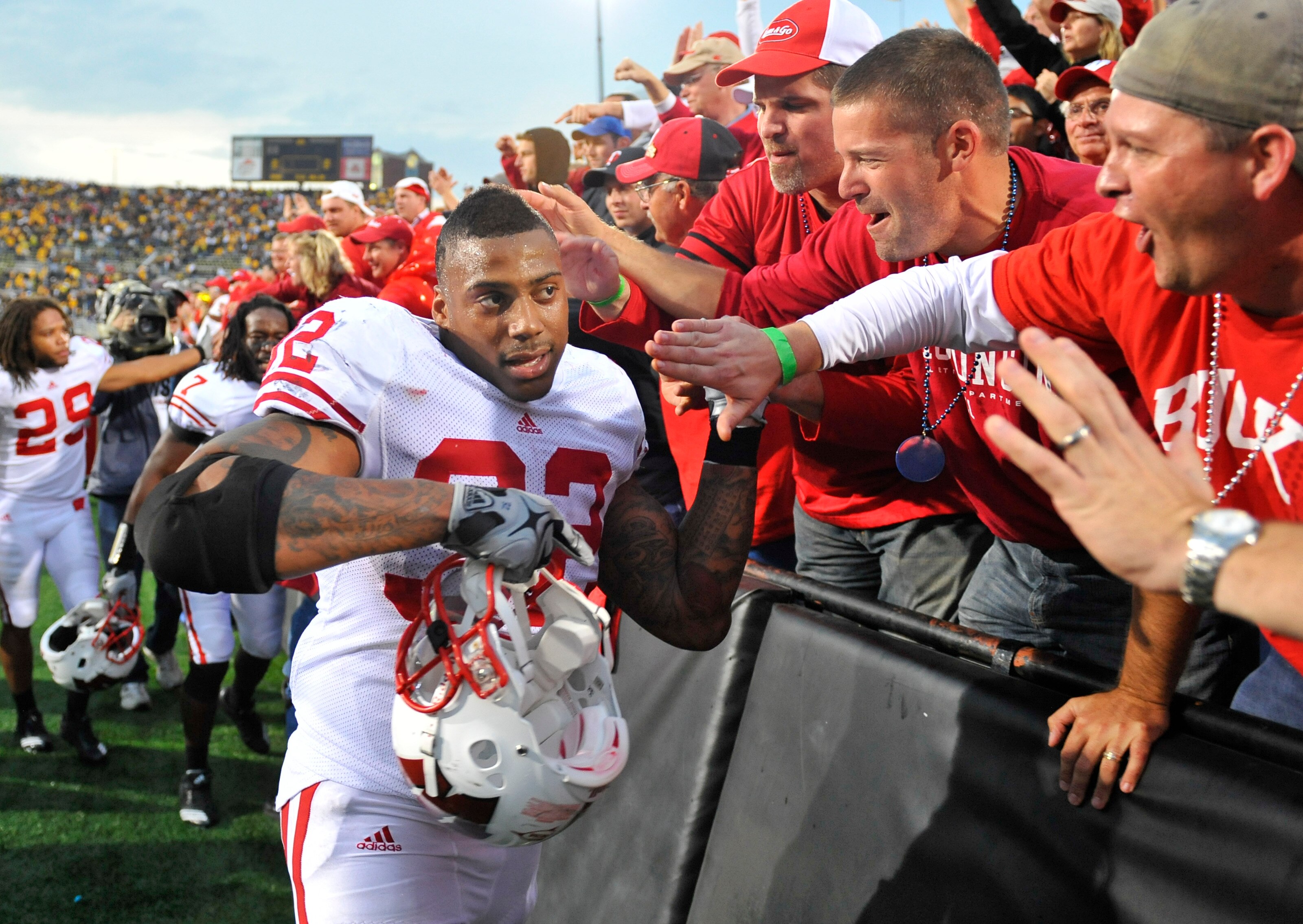 IOWA CITY, IA - OCTOBER 23: Running back John Clay #32 of the Wisconsin Badgers celebrates with fans after Wisconsin's victory over the University of Iowa at Kinnick Stadium on October 23, 2010 in Iowa City, Iowa. Wisconsin won 31-30 over Iowa. (Photo by 
