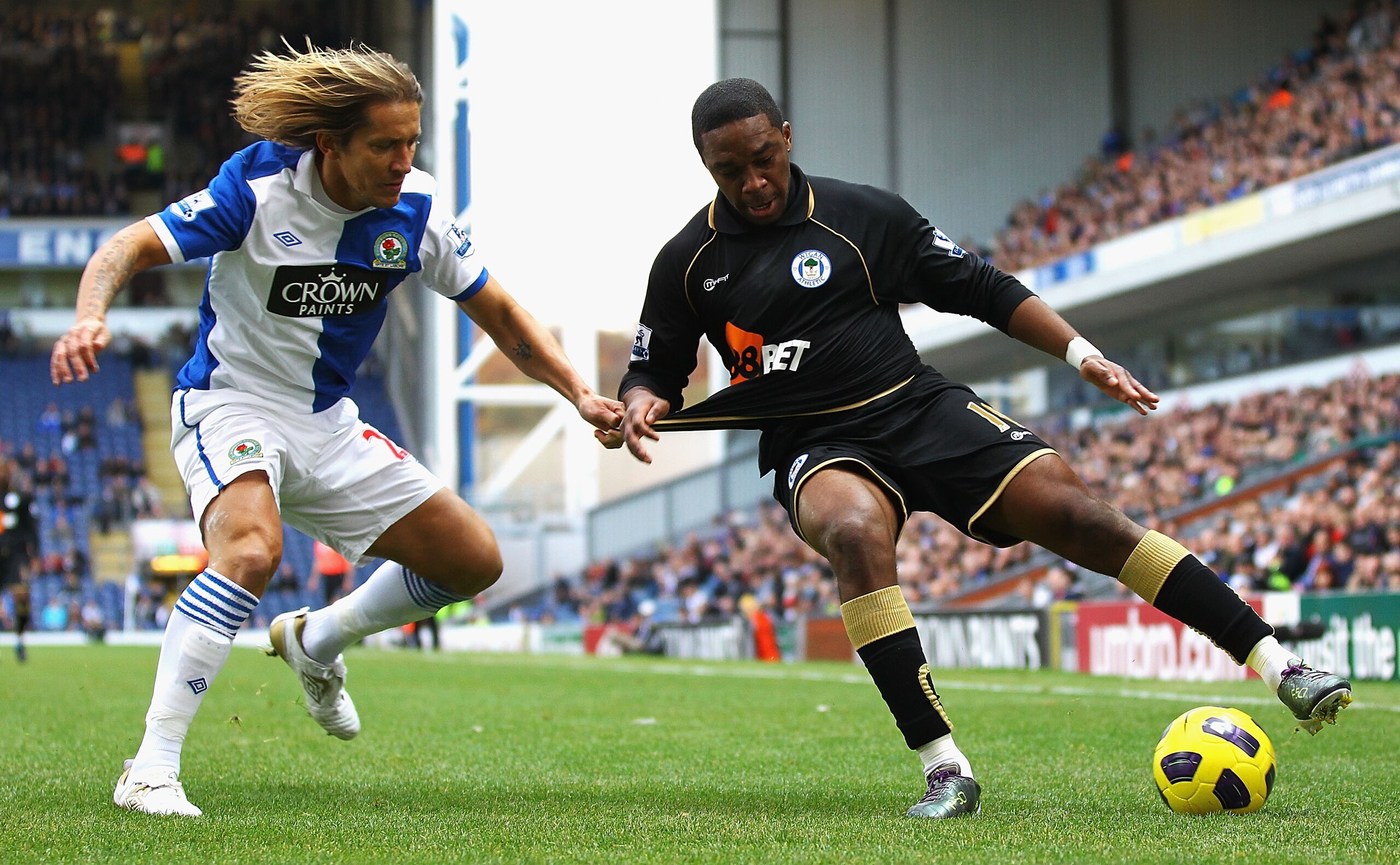 BLACKBURN, ENGLAND - NOVEMBER 06:  Michael Salgado of Blackburn and Charles N'Zogbia of Wigan challenge for the ball during the Barclays Premier League match between Blackburn Rovers and Wigan Athletic at Ewood park on November 6, 2010 in Blackburn, Engla
