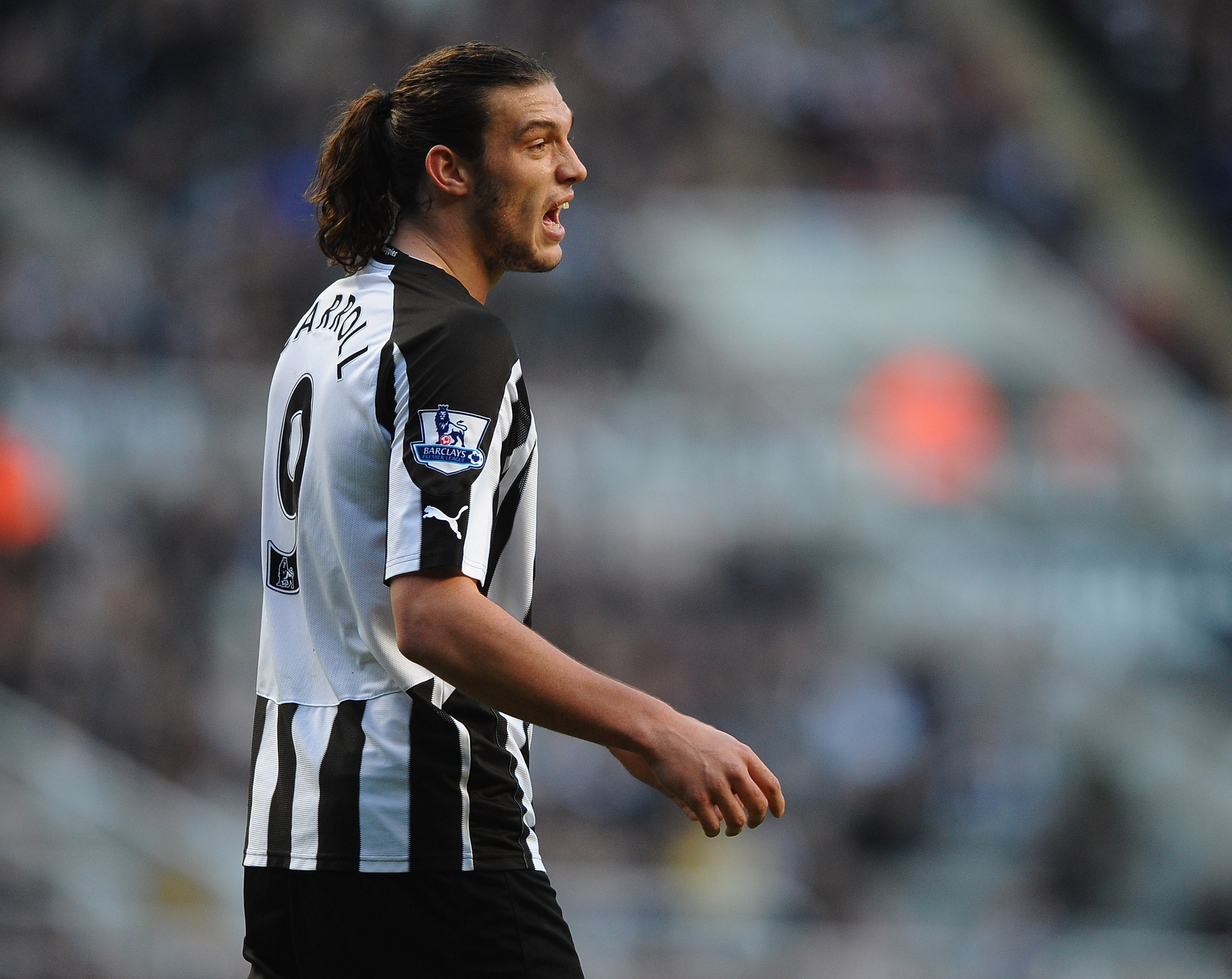 NEWCASTLE UPON TYNE, ENGLAND - NOVEMBER 13:  Andy Carroll of Newcastle United looks on during the Barclays Premier League match between Newcastle United and Fulham at St James' Park on November 13, 2010 in Newcastle upon Tyne, England.  (Photo by Laurence