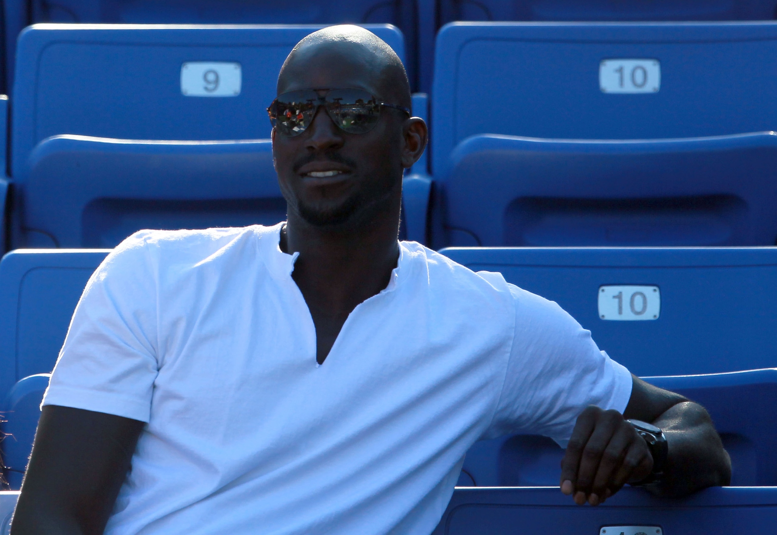 LOS ANGELES, CA - JULY 29:  NBA basketball player Kevin Garnett watches the match between James Blake and Benjamin Becker of Germany during the Farmers Classic at the Los Angeles Tennis Center - UCLA on July 29, 2010 in Los Angeles, California.  (Photo by